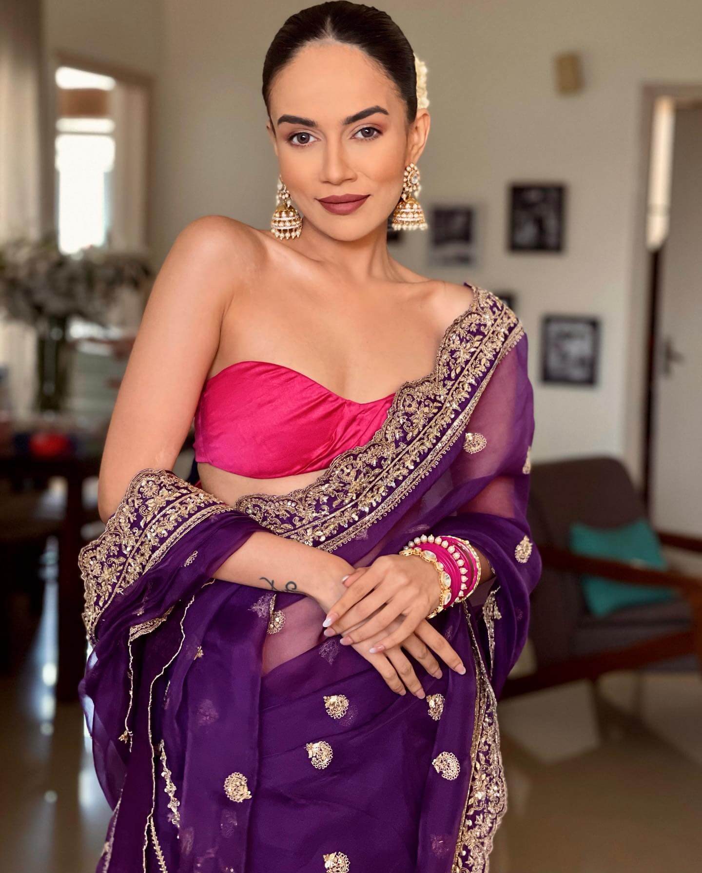 Komal Pandey Is A Vision To Behold In A Purple Embroidered Saree With Pink Tube Blouse & Beautiful Jhumkis
