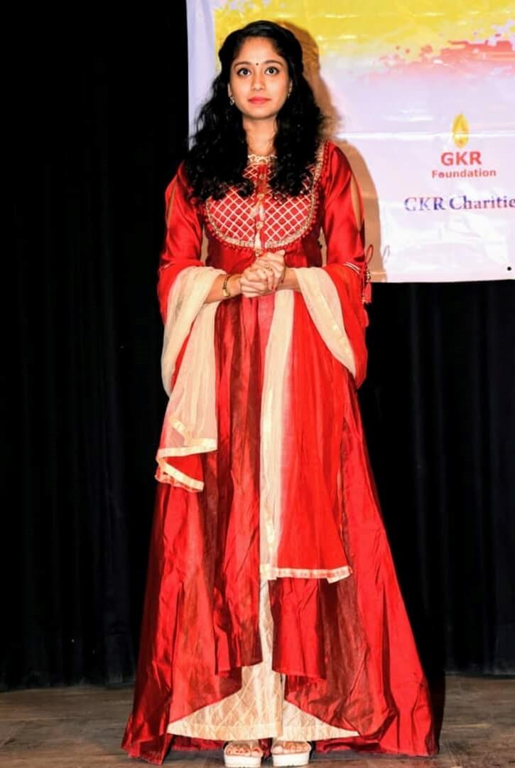 Krisha Kurup In Charity Function Wearing Red & Beige Festive Gown & Dupatta