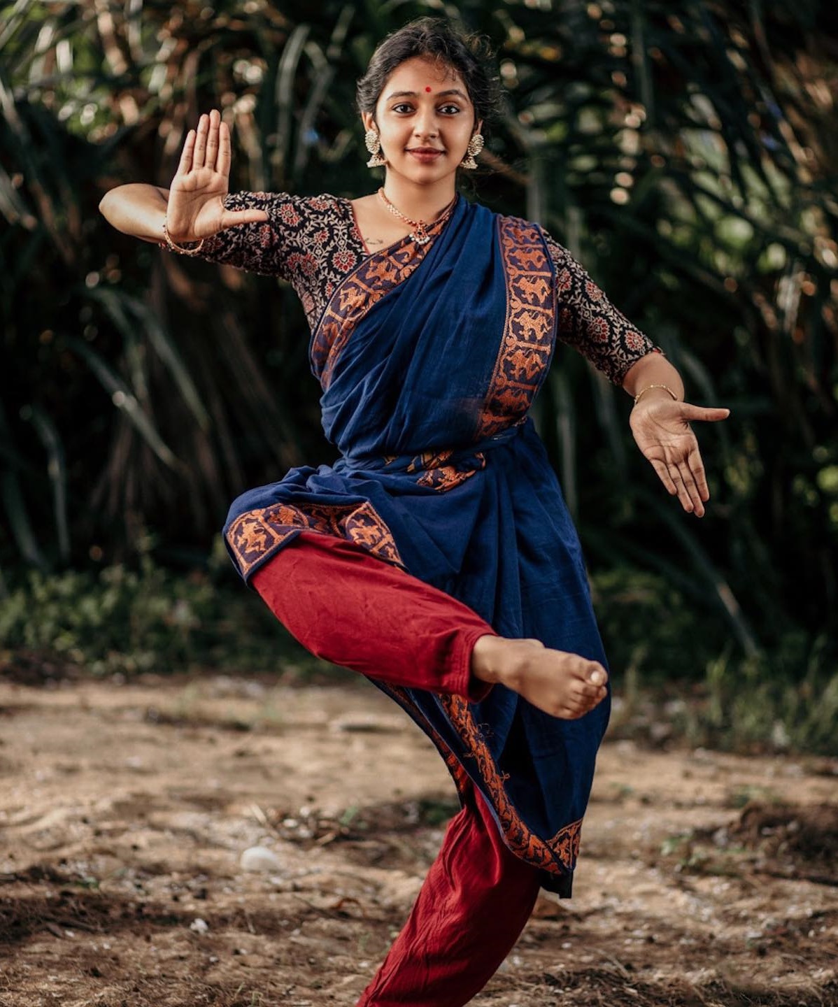Lakshmi Menon In Blue Saree Doing Kathak Pose