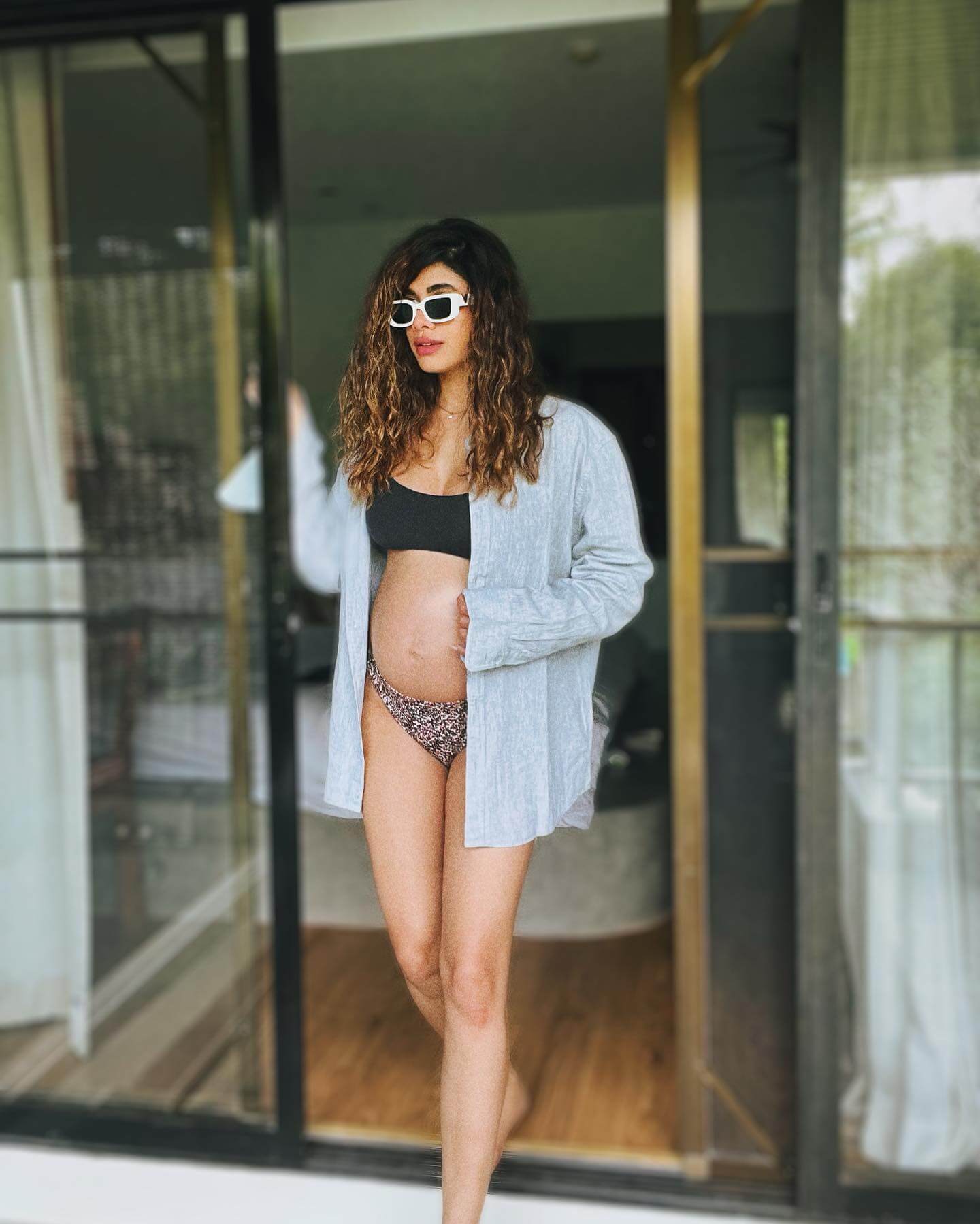 Malvika Sitlani Slaying The Bikini Look With Her Baby Bump Sporting With Chic White & Black Sunglasses