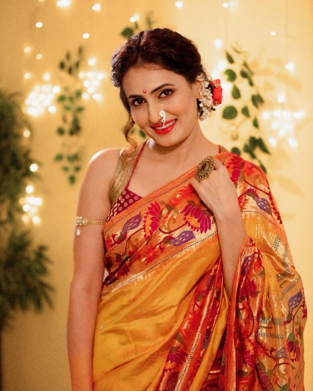 Namrata Gaikwad In Yellow & Red Floral Print Saree With Sleeveless Blouse