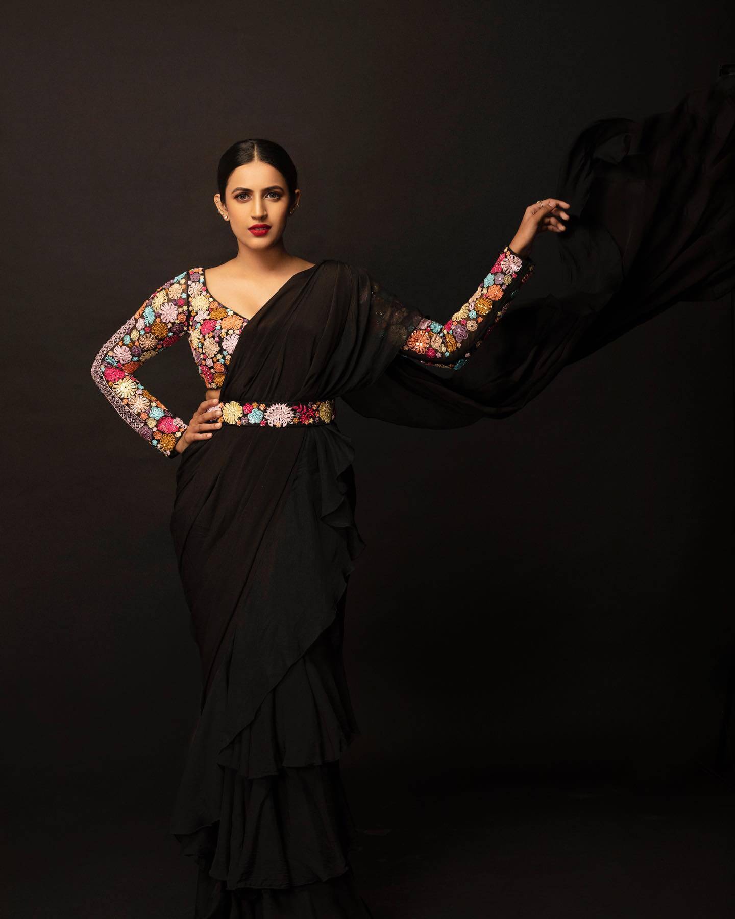 Niharika Konidela Divine Look In Black Ruffled Saree Paired With Floral Multicolour Embroidered Full Sleeves Blouse & Waist Belt