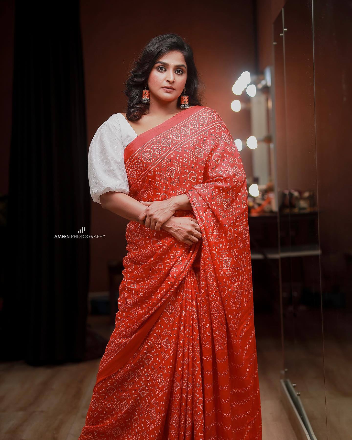 Remya Nambeesan In Red Bandhani Print Saree Paired With White Blouse