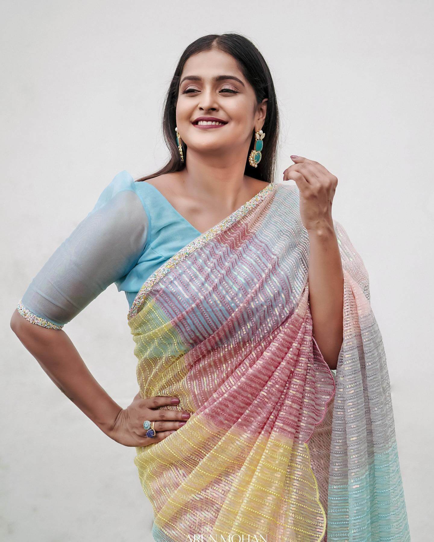 Remya Nambeesan In  Vibrant  Colourful Sequined Saree Paired With Blue Blouse