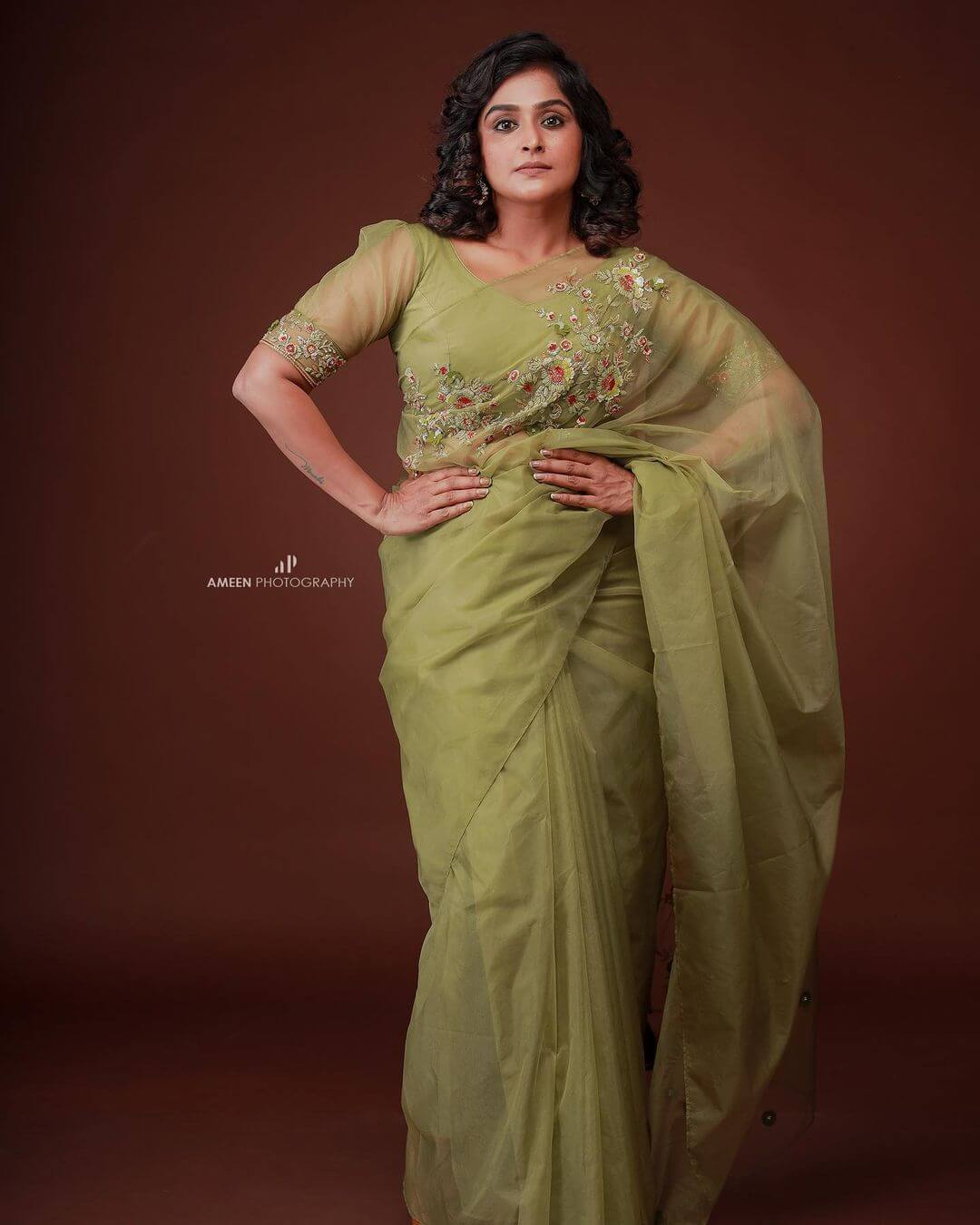 Remya Nambeesan Look Gorgeous In Green Net Embroidered Saree