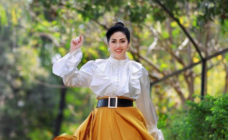 Sadha Mesmerizing Look In Yellow Flared Long Skirt With Pearl White Ruffled Dramatic Blouse Styled With Black Waist Belt