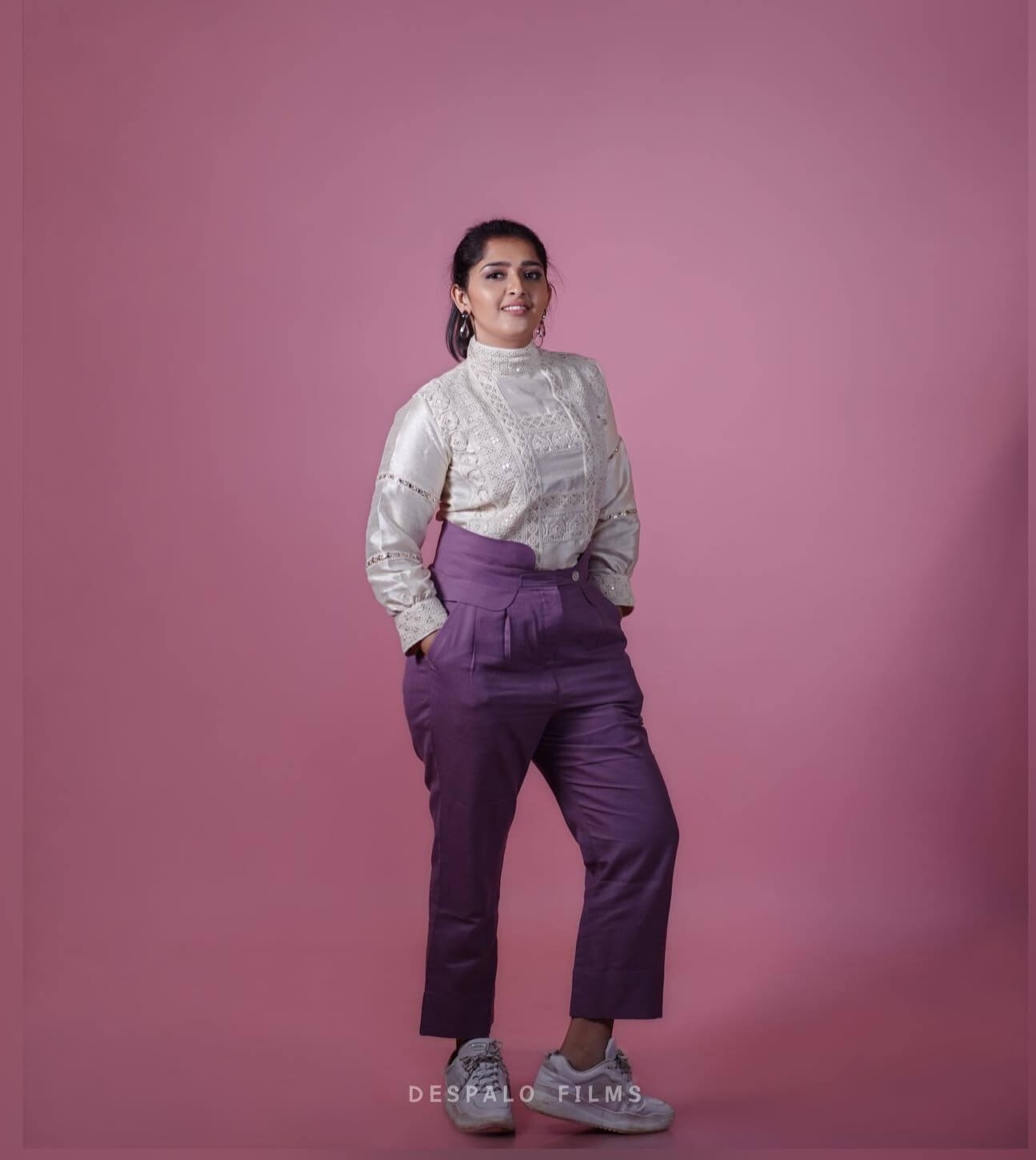 Sanusha Santhosh Bossy Look In White Top With Purple Trouser