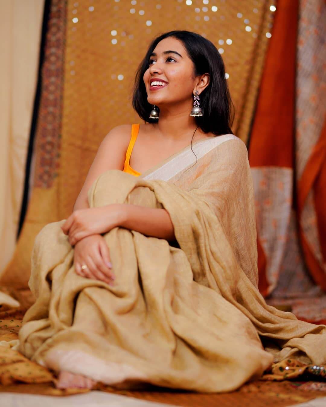 Shivathmika Rajashekar In Beige Cotton Saree With Yellow Blouse