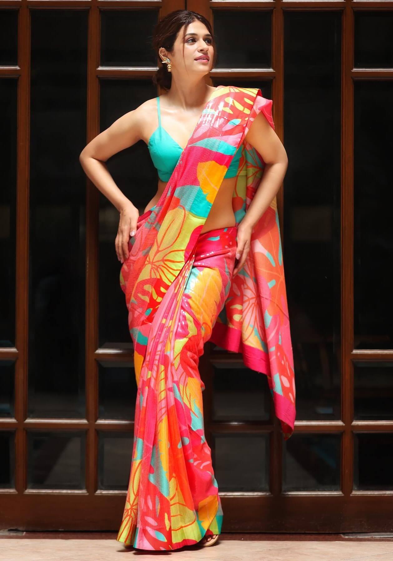 Shraddha Das In Multicolour Saree Paired With Aqua Blue Noddle Strap Blouse