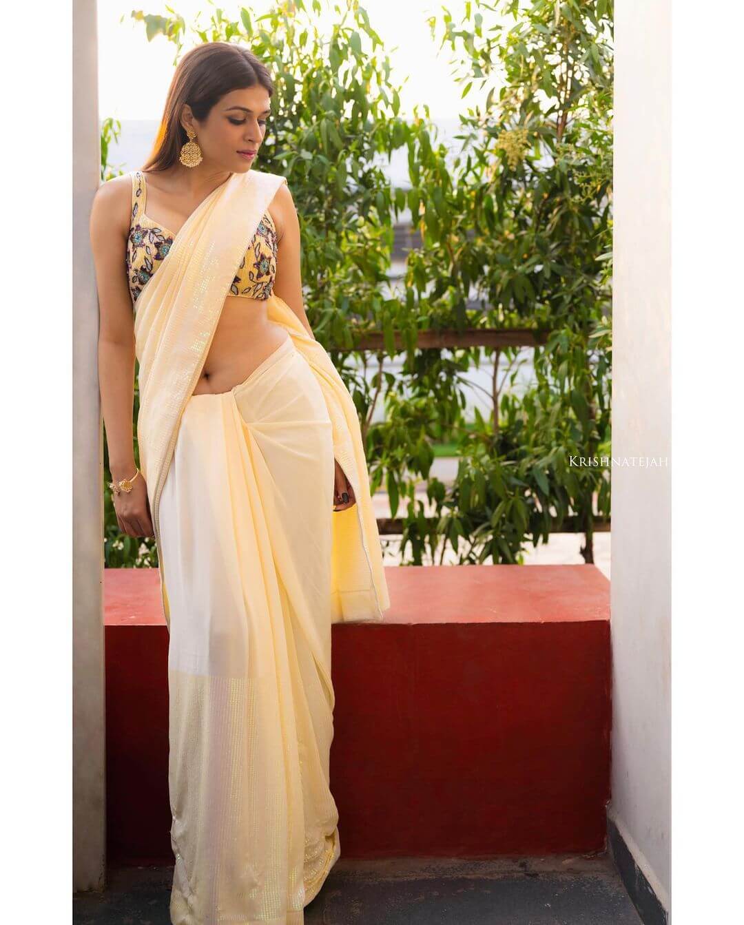 Shraddha Das In Off White Sequined Saree Paired With Yellow Embroidered Sleeveless Blouse