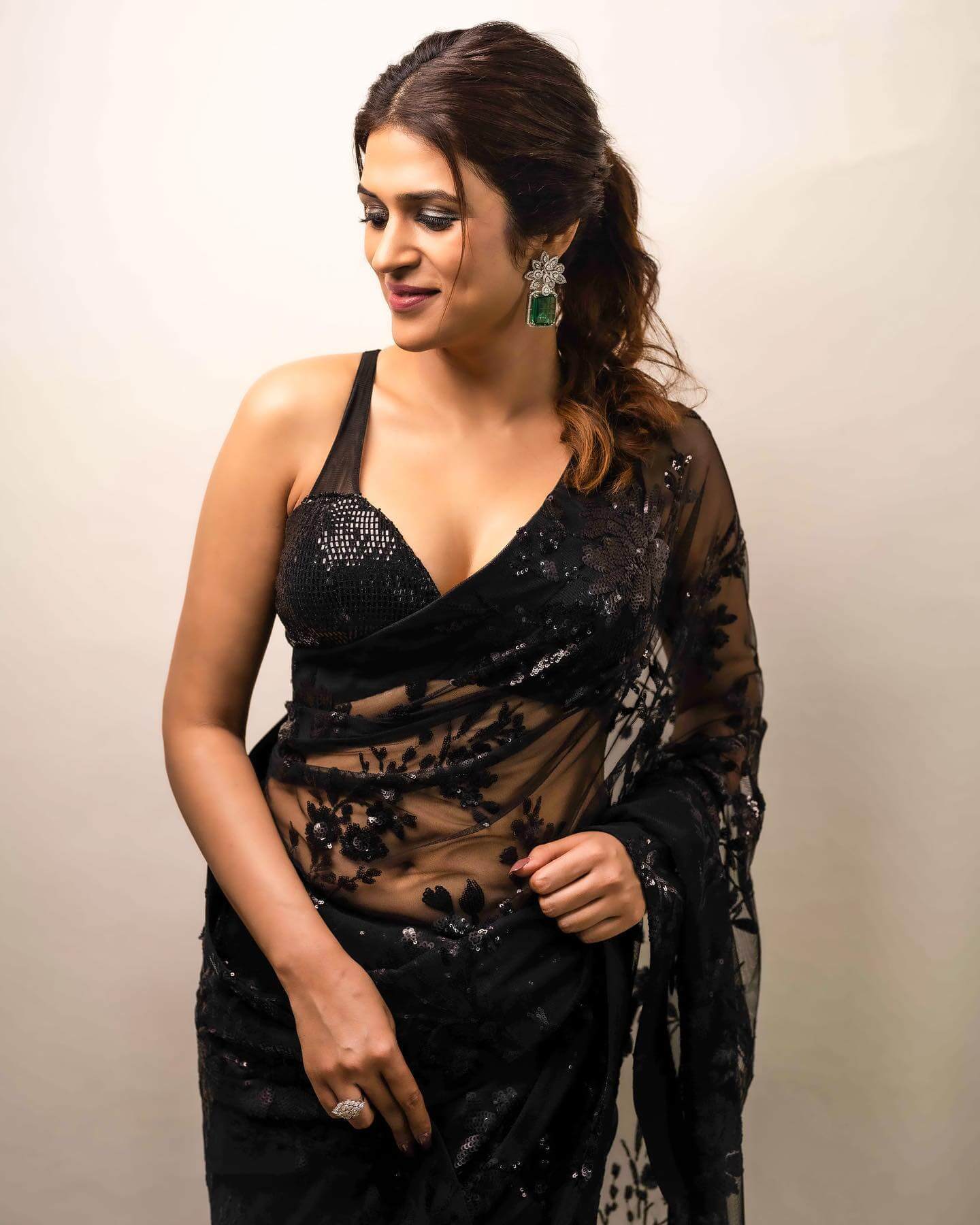 Shraddha Das Sexy Look In Black Embroidered Net Saree Paired With Sleeveless Deep Neck Blouse