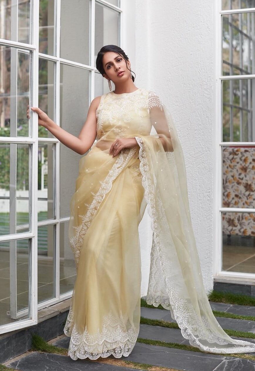 South Actress Lavanya Tripathi In Light Yellow Orgenza Silk Embroidered Border  Saree