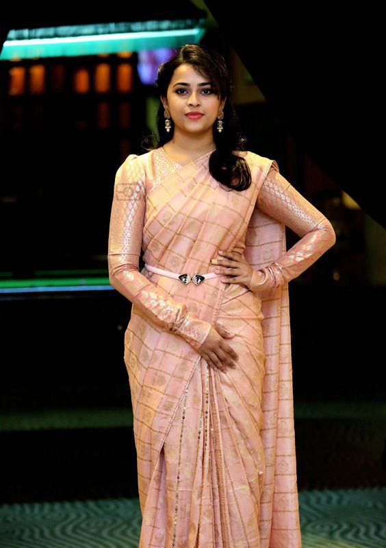 Sri Divya Is Looking Beautiful In Pastel Pink Saree With Full Sleeves Blouse And Belt