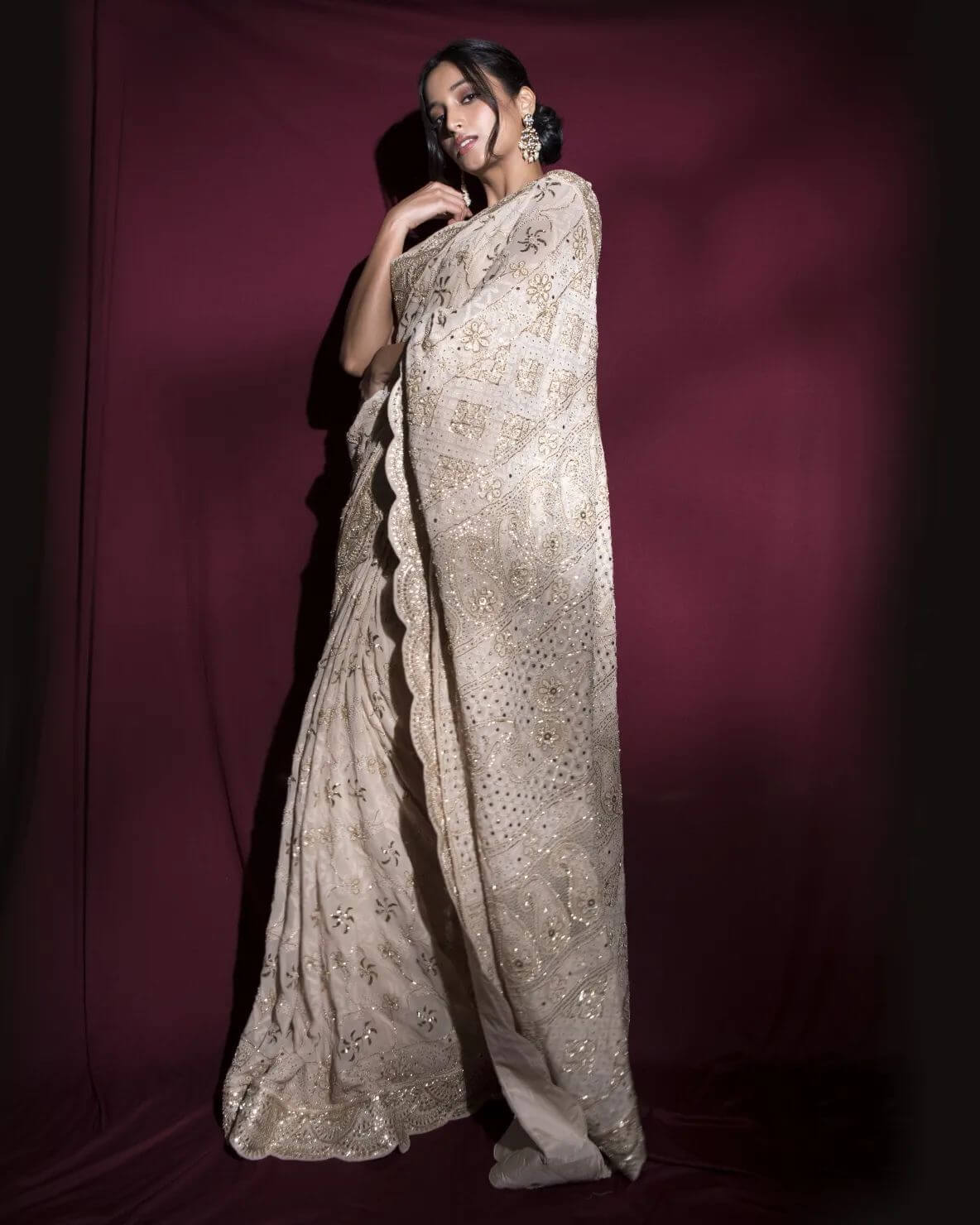 Srinidhi Shetty Elegant Look In White Golden Embroidery Saree With Sleeveless Blouse