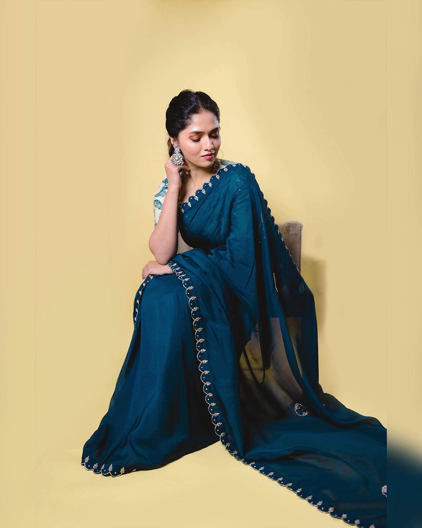 Sunainaa In Blue Sheer Saree Saree Paired With White & Blue Embroidered Blouse