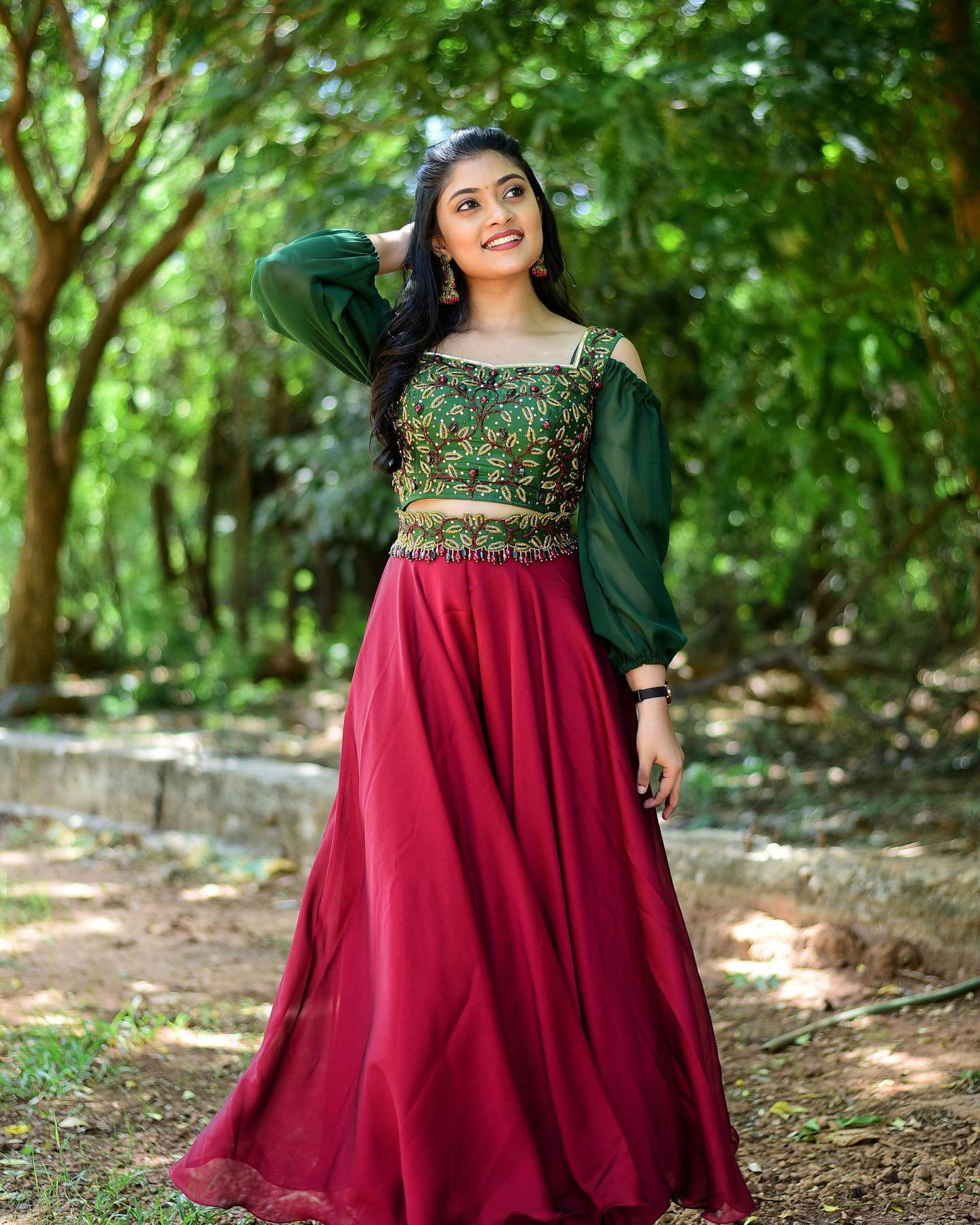 Ammu Abhirami Mesmerises With Her Look In Maroon Skirt With Green Sweet Heart Neckline Embroidered Blouse