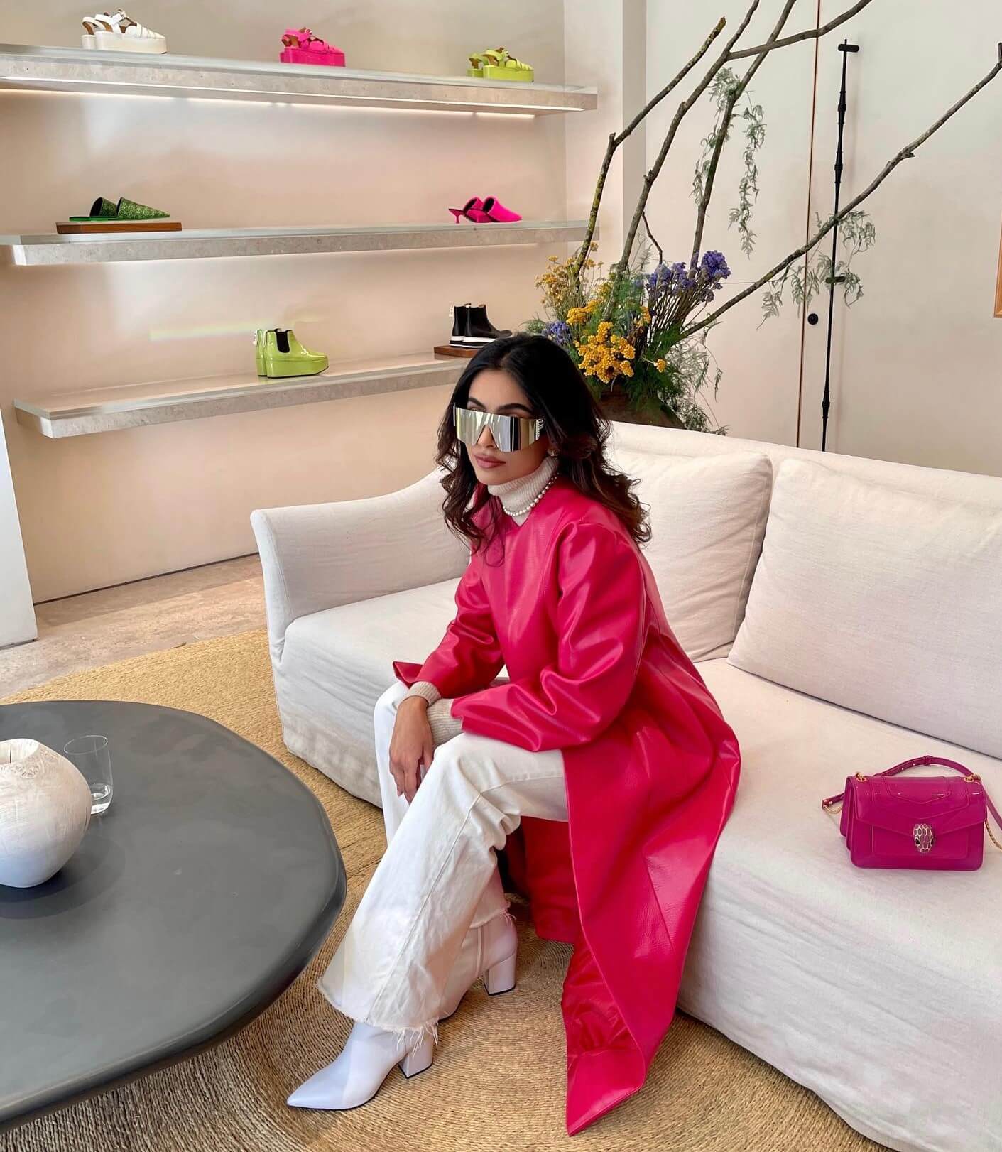 Banita Sandhu In Neon Pink Leather Trench Dress With White Denim Jeans & Sexy Sunglasses