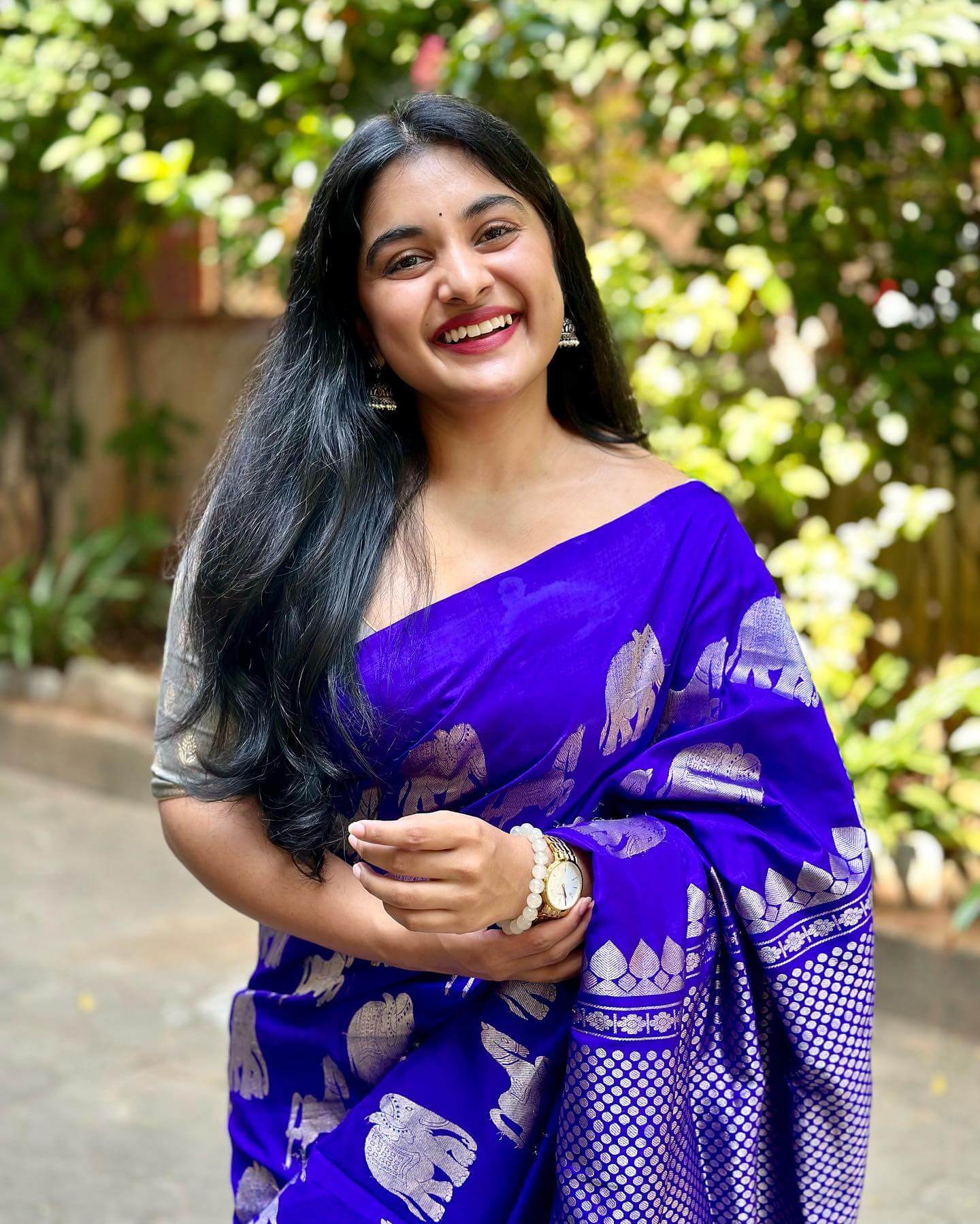 Beautiful Nivetha Thomas In Blue Digital Printed Saree Paired With Silver Blouse