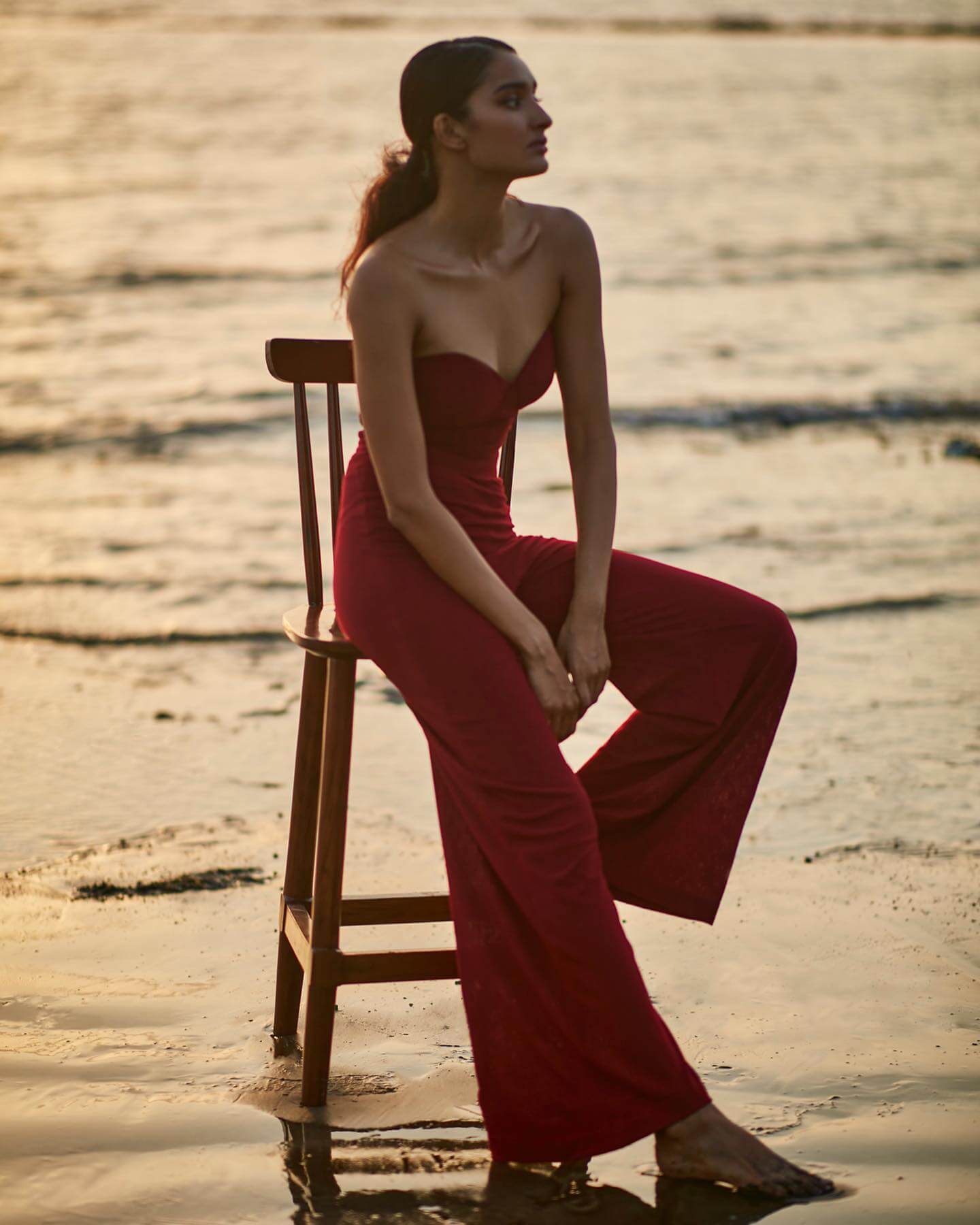 Dayana Erappa In Red Jumpsuit With Sweetheart Neckline