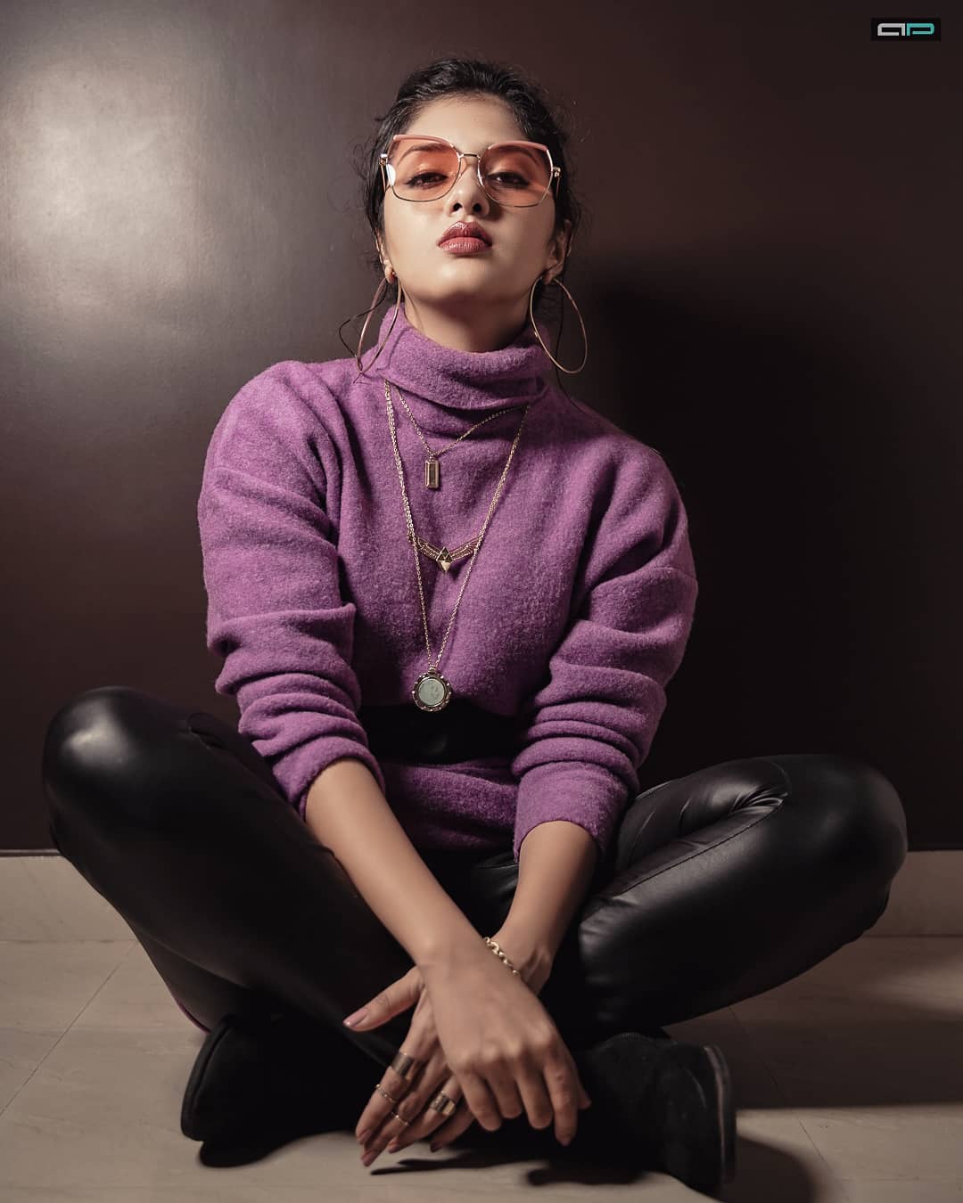 Gayathri Suresh Casual Winter Look In Purple High Neck Pullover With Black Leather Tights Paired With Minimal Jewellery & Chic Sunglasses