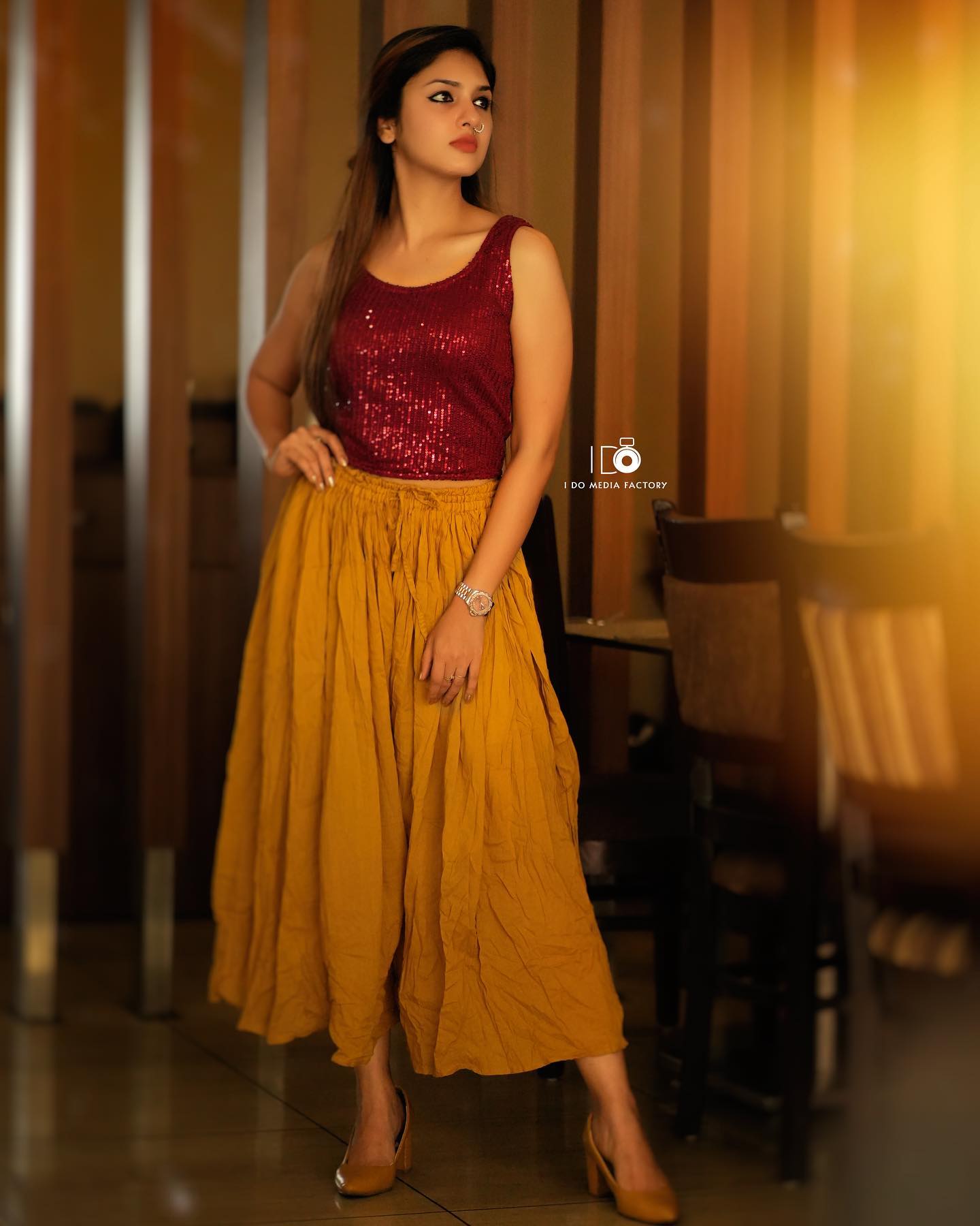 Gayathri Suresh In Red Sequin Tank Top With Yellow Palazzo Pants