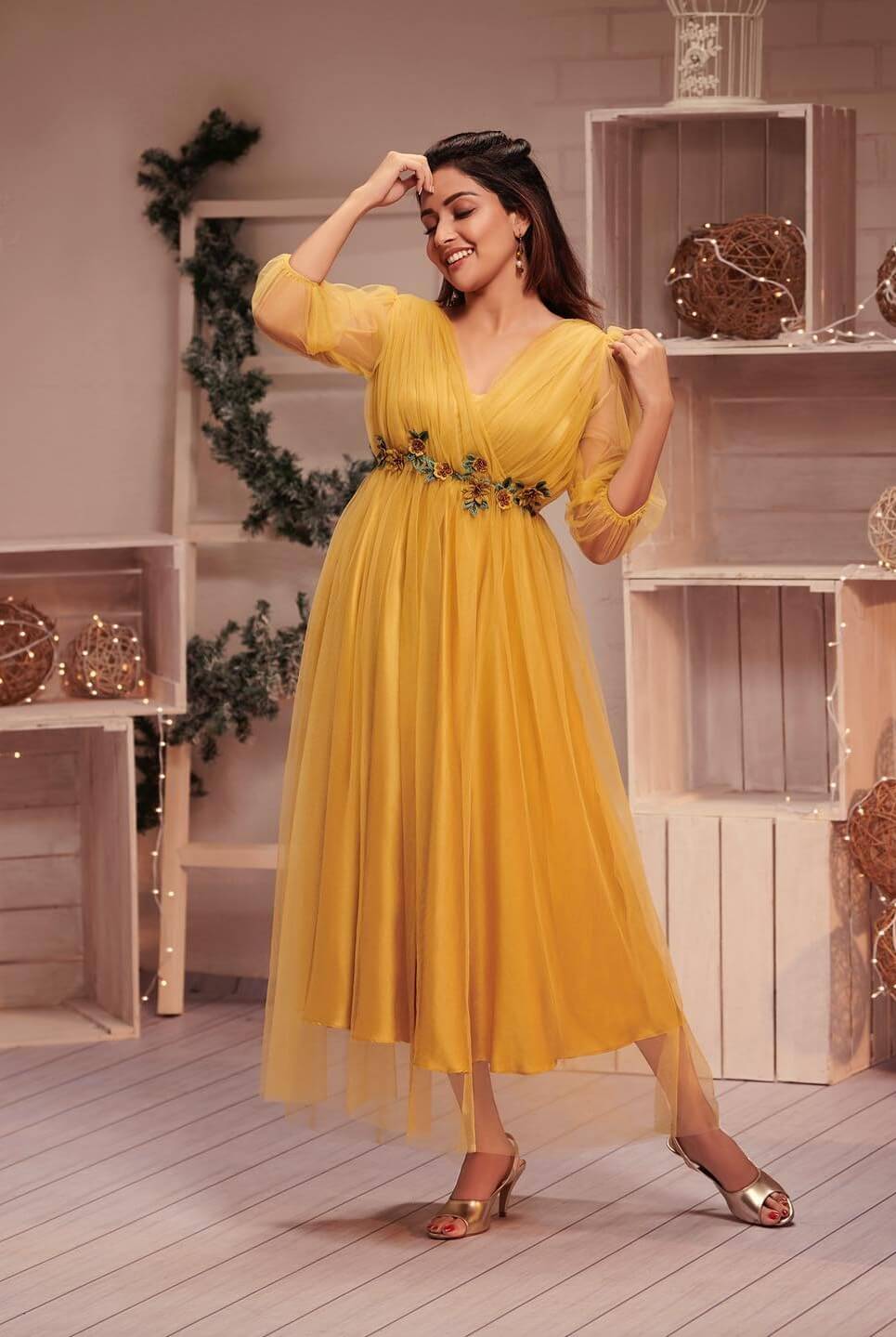 Gorgeous Mahima Nambiar In Yellow Draped Net Fit & Flare Puffed Sleeves  Dress