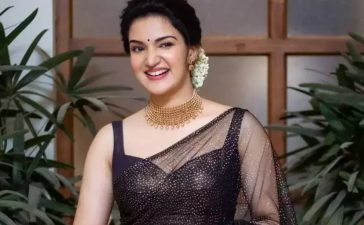 Honey Rose Dazzling Look In Black Glittery Sheer Saree Paired With Black Blouse & Gold Choker Necklace