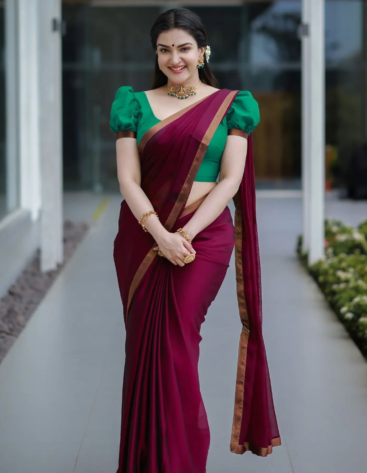 Honey Rose In Wine Silk Saree With Golden Border Paired With Green Puffed Half Sleeves Blouse Traditional Outfits & Looks