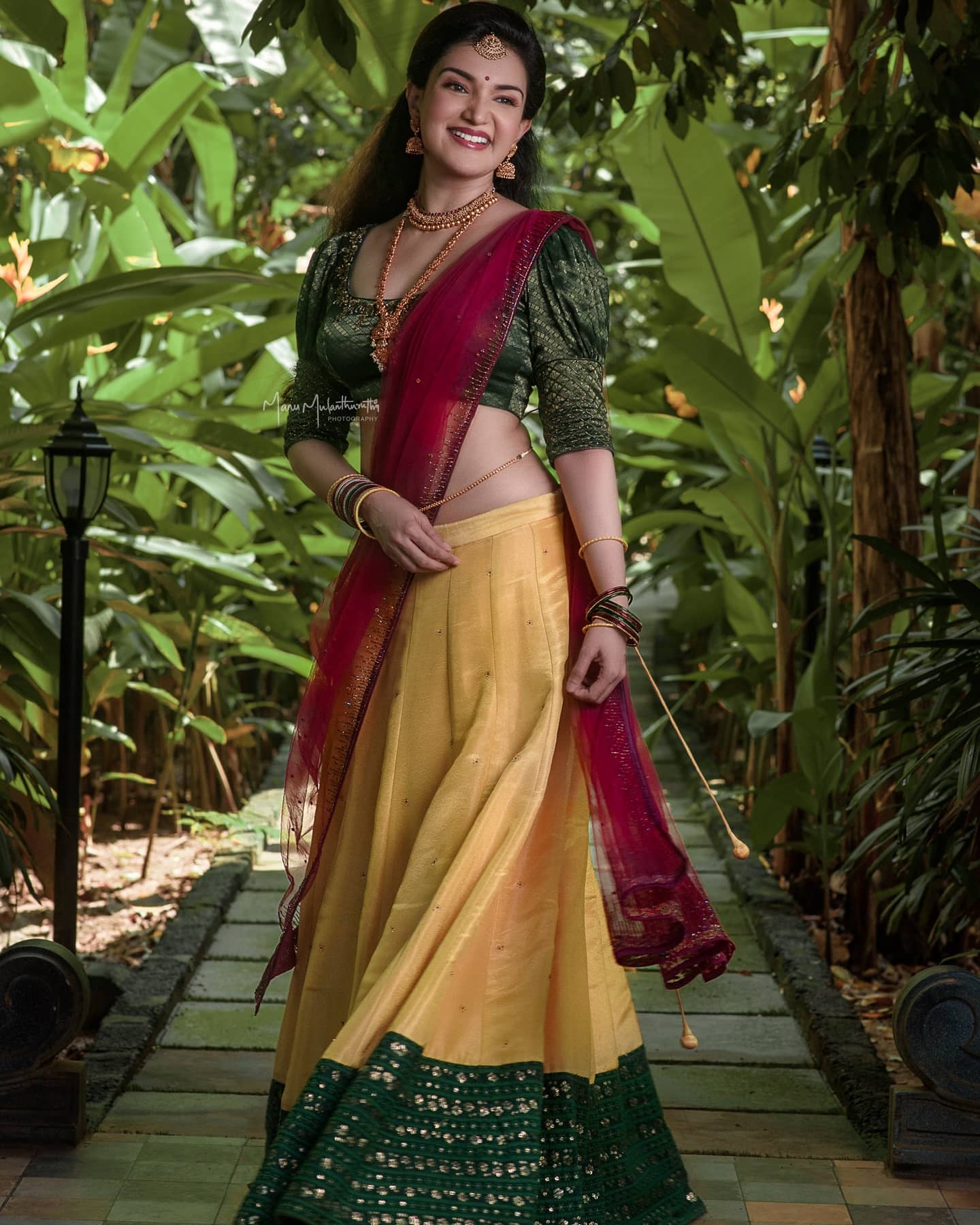 Honey Rose Look Pretty Amazing in a Yellow & Green Lehenga Set Paired With Pink Net Dupatta
