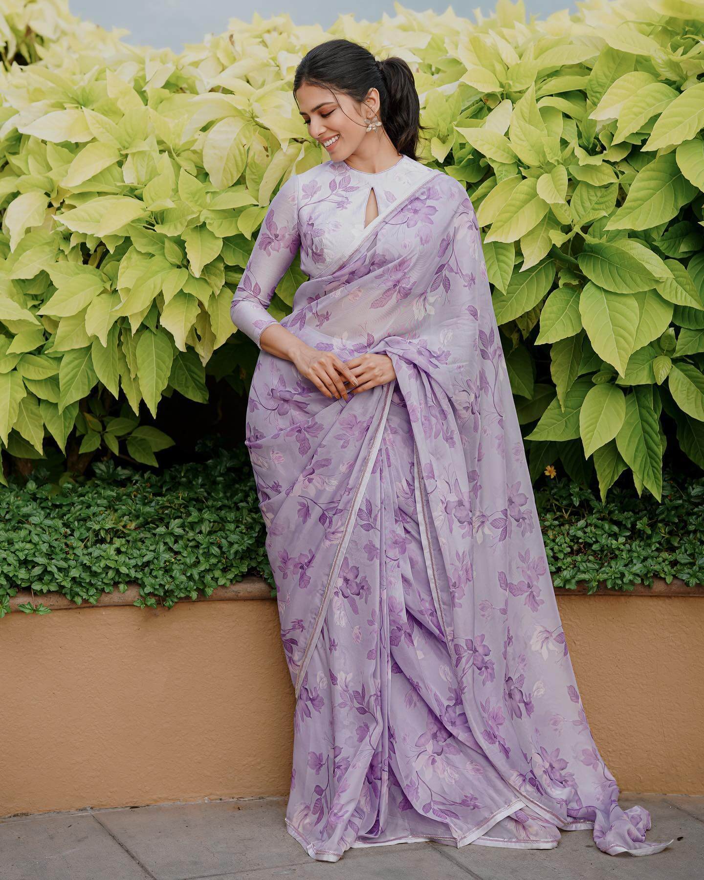Malavika Mohanan In Chic & Elegant Lavender Chiffon Floral Print Saree Look