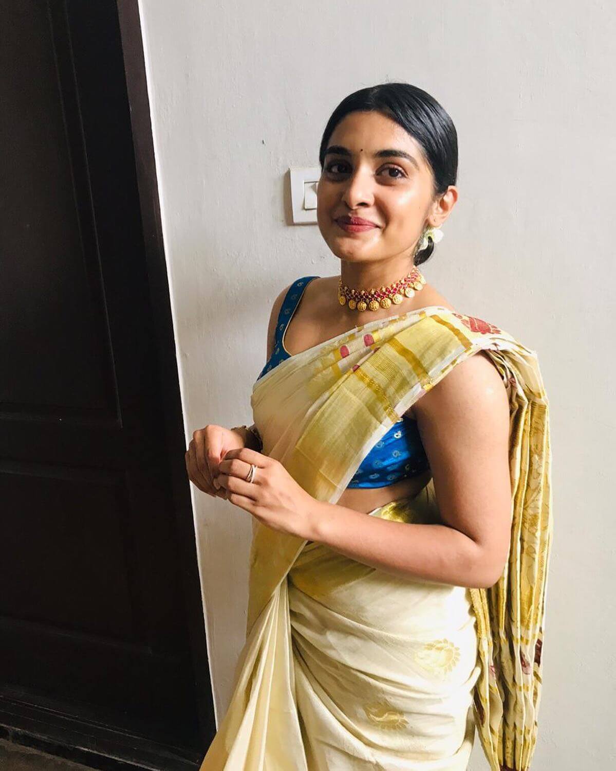 Nivetha Thomas In Chic Off-White Cotton Saree With Sleeveless Blue Blouse Looks Festive Ready Traditional Outfits & Looks