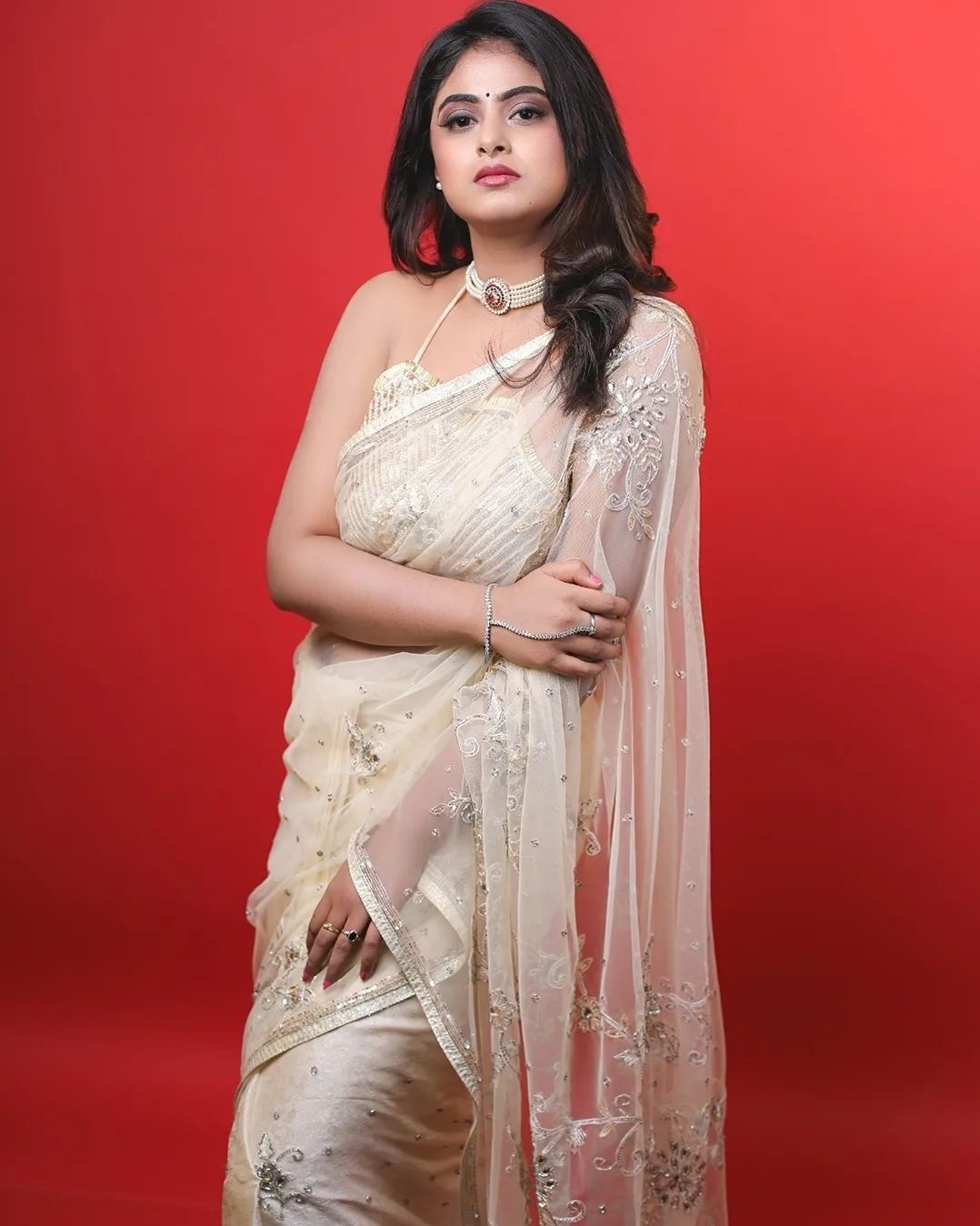 Popular Supernatural Serial Jothi Fame Meghasri  In White Net Embroidered Saree With Noddle Strap Blouse