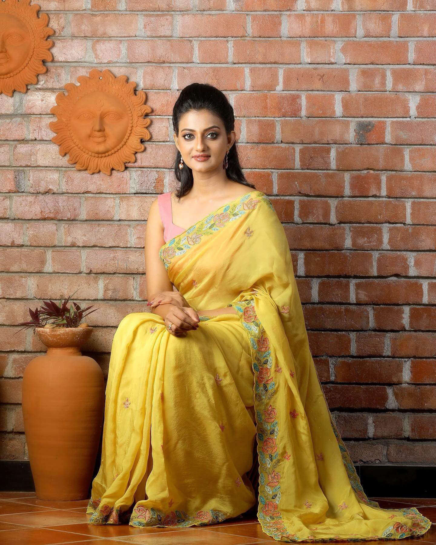 Priyanka Nair Look Pretty Amazing In a Yellow Floral Printed Saree With Contrasting Sleeveless Pink Blouse
