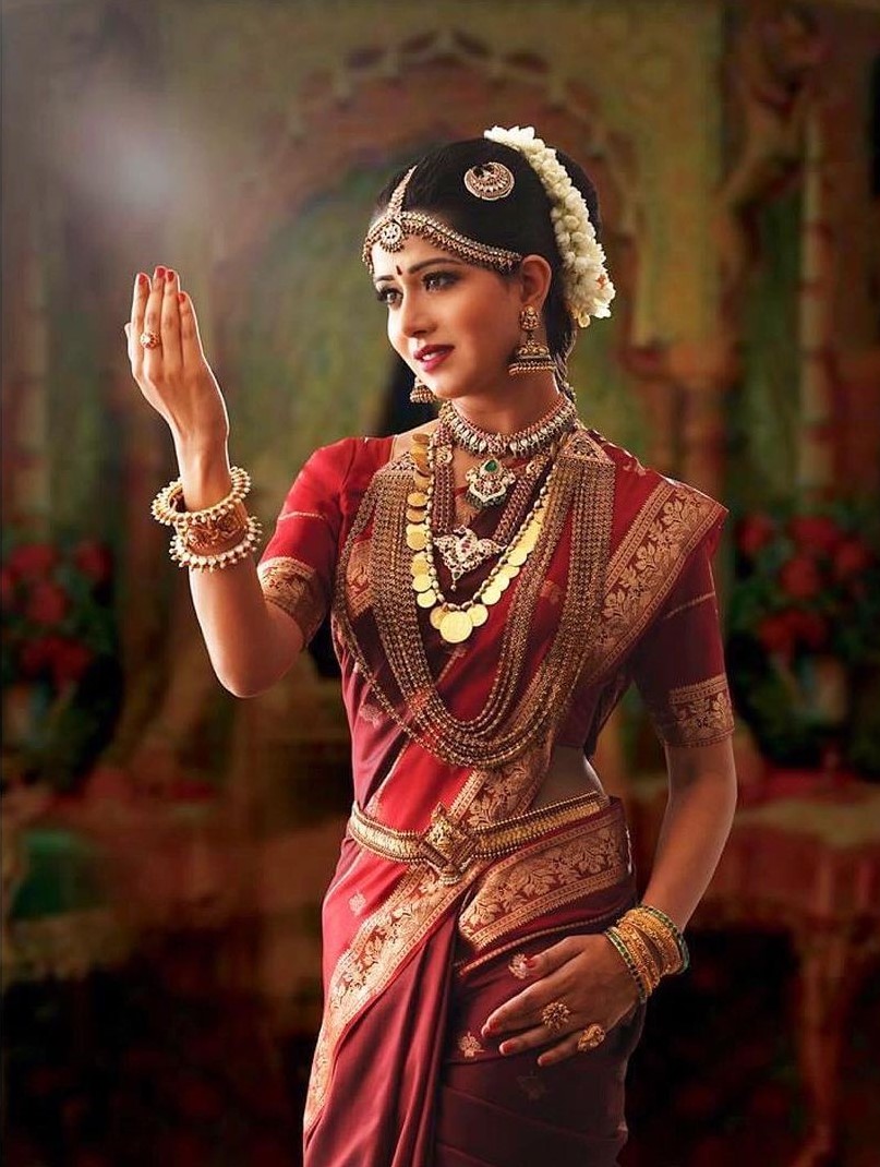 Raiza Wilson Traditional South Indian Bridal Look Wearing Maroon Silk Saree With Layered Kundan & Gold Jewellery