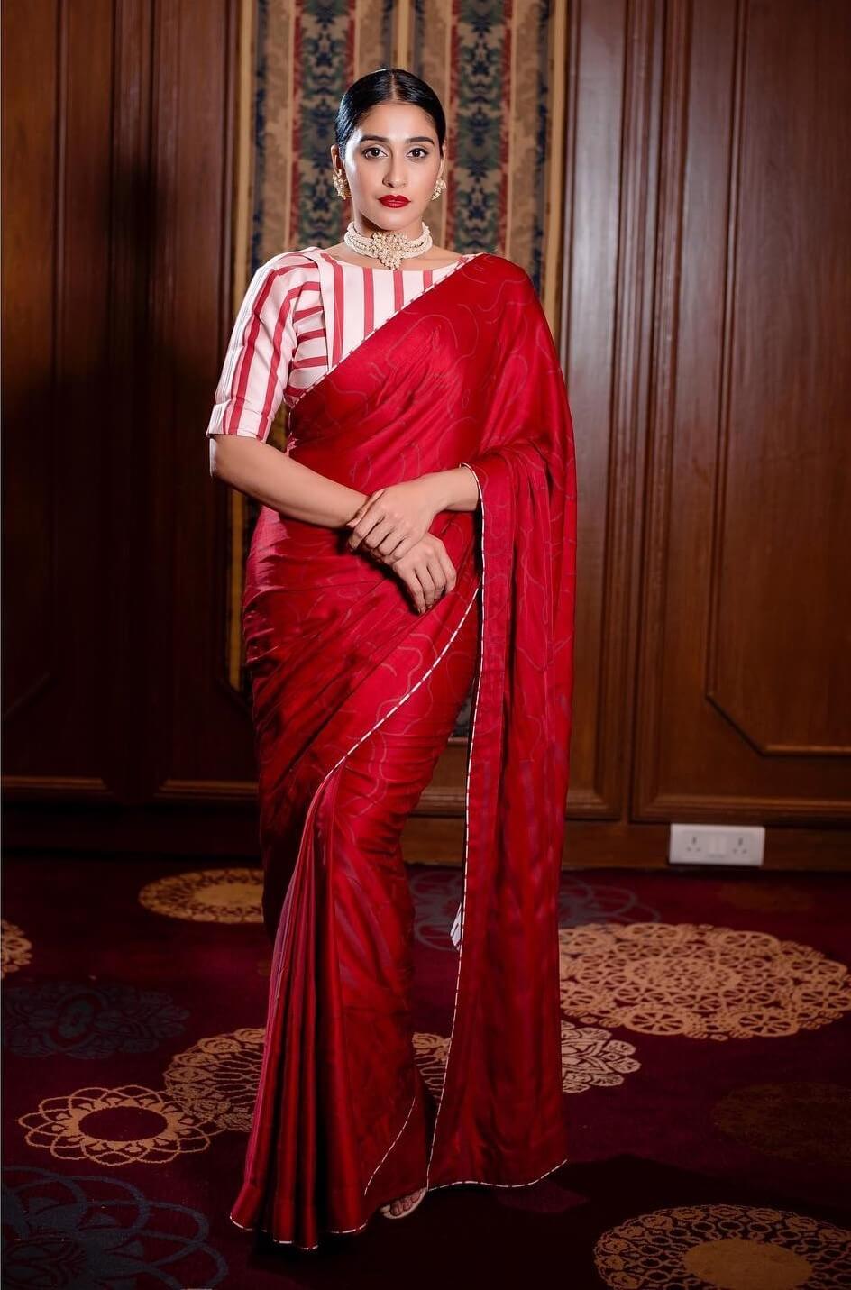 Regina Cassandra Slaying The Saree Outfits and Looks In Smoking Hot Red Solid Saree Wa with Red & White Strip Blouse