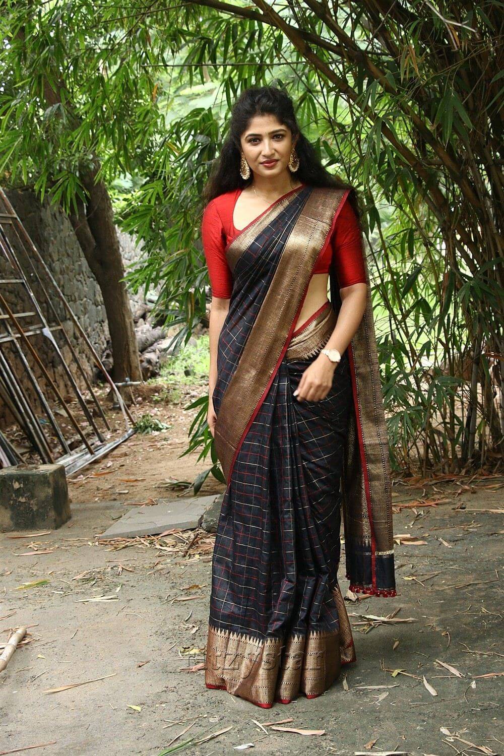 Roshni Prakash In Black & Red Zari Woven Saree With Red Blouse Lovely Outfit Looks