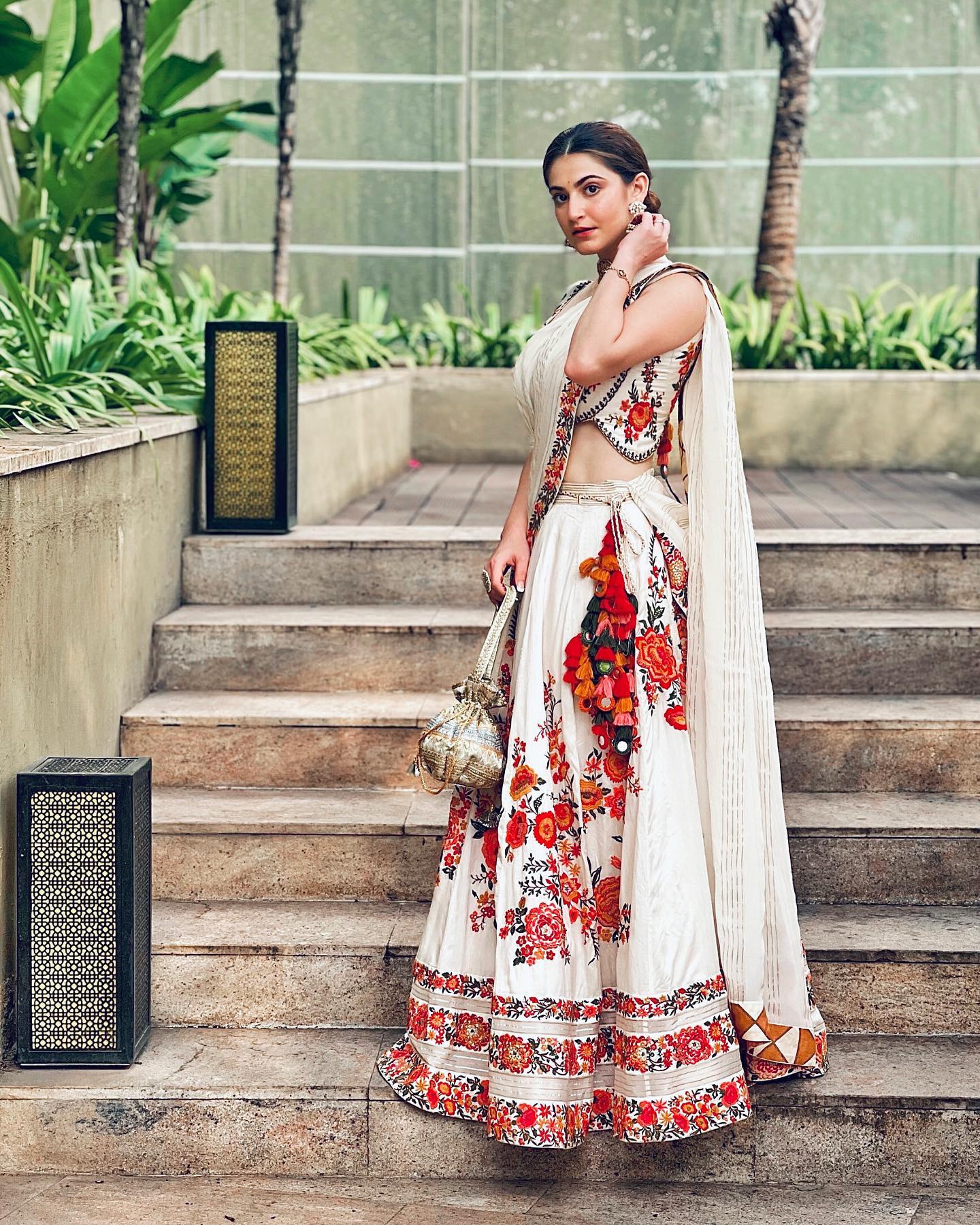 Shivaleeka Oberoi Is A Vision To Behold In A Vibrant Floral Embroidered White Lehenga With Potali Handbag - Exclusive Outfits & Looks