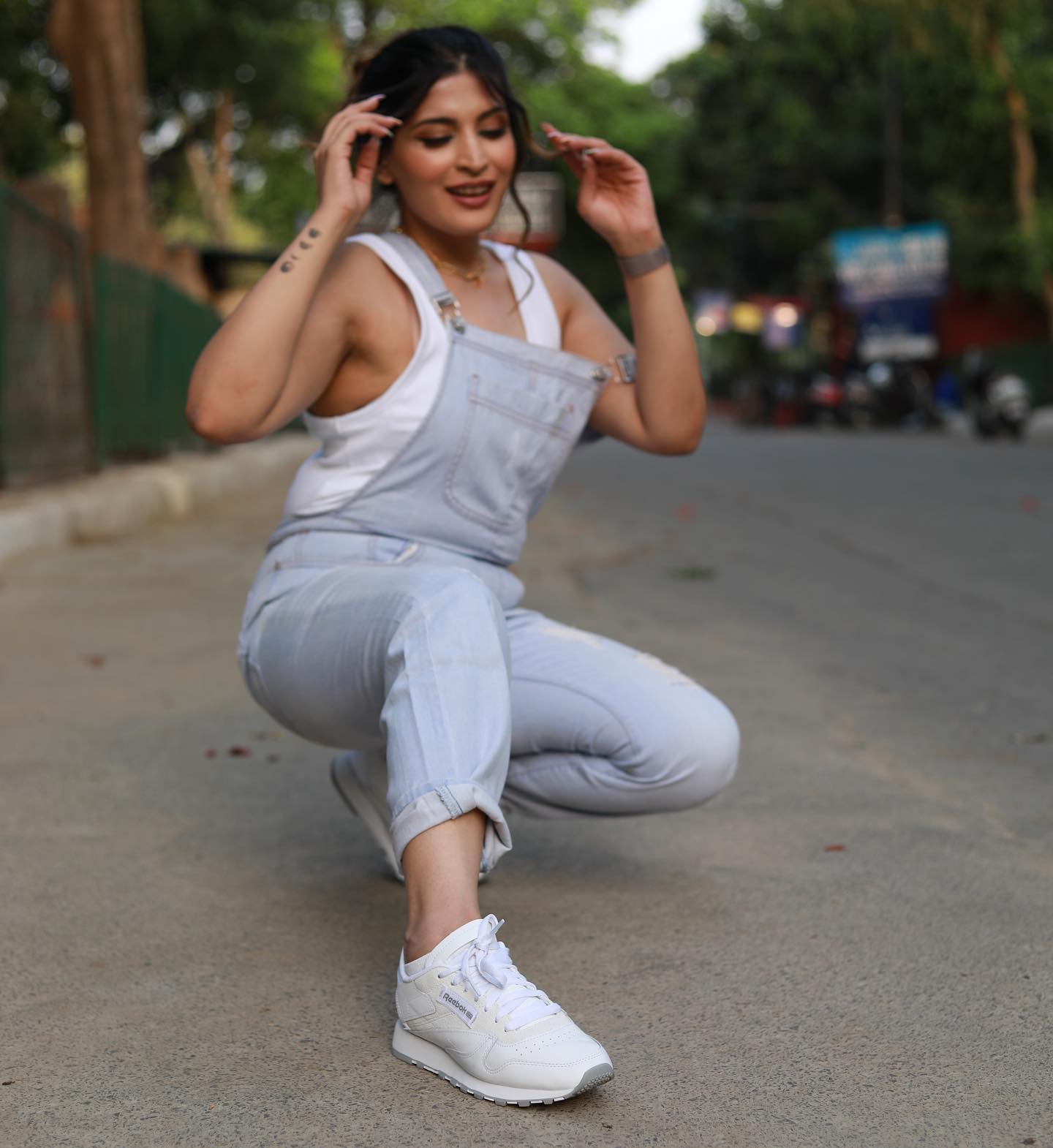 Shreya Jain In Her Casual Denim Dungaree & White Sleeveless Tank Top Paired With White Sneakers Exclusive Outfits & Looks