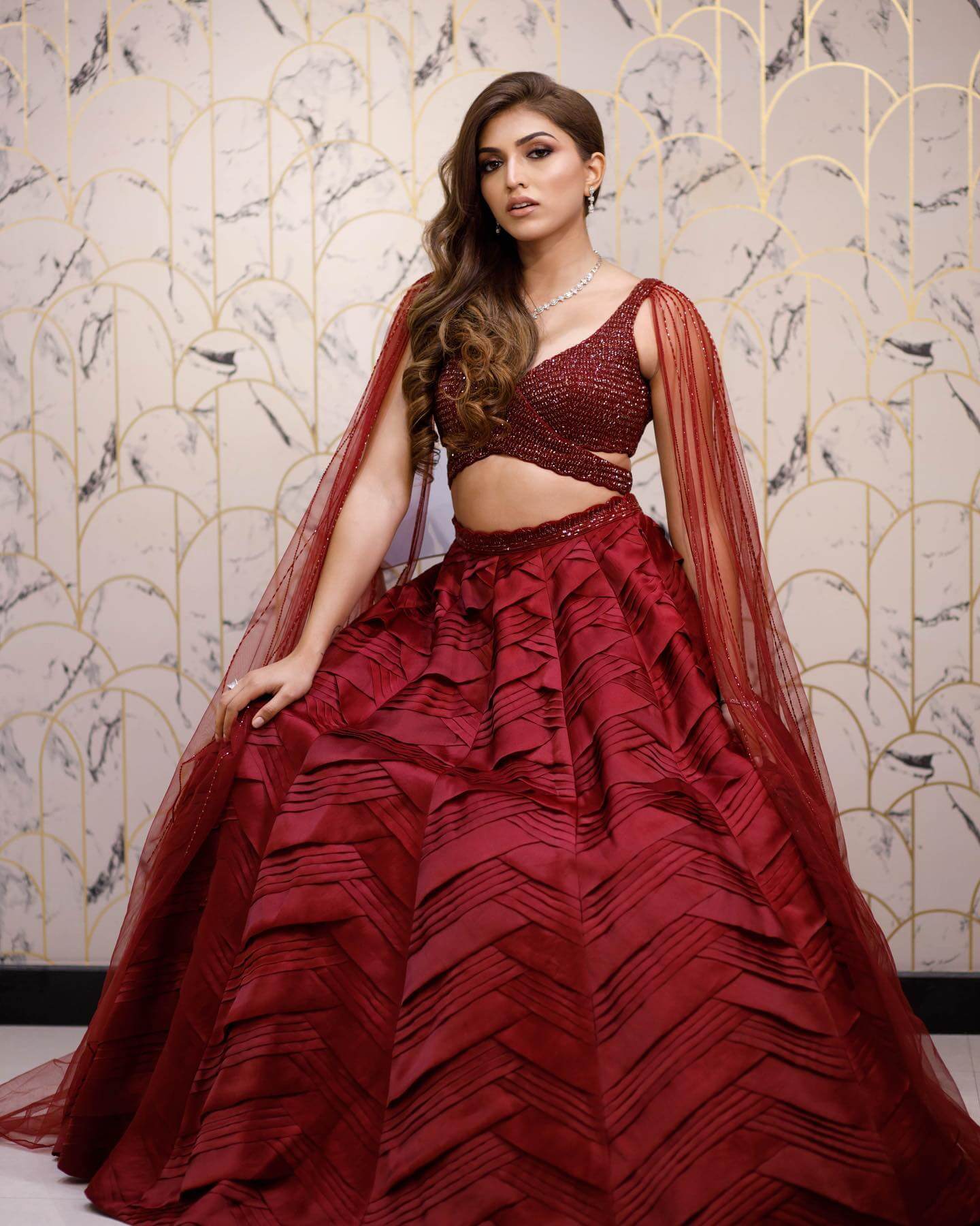 Shruti Sinha Gives Us Diva Vibes In Maroon Designer Leaf Pattern Cut Lehenga Set