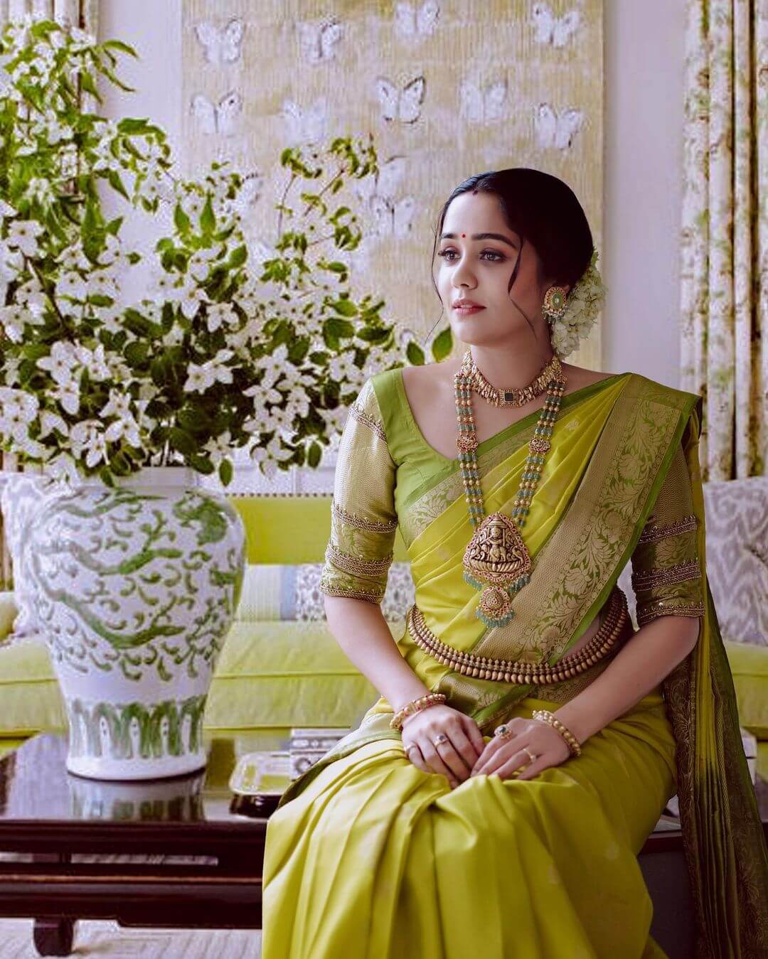 South Actress Ayilya Nair In Sheen Green Silk Saree With South Antique Gold Jewellery Set
