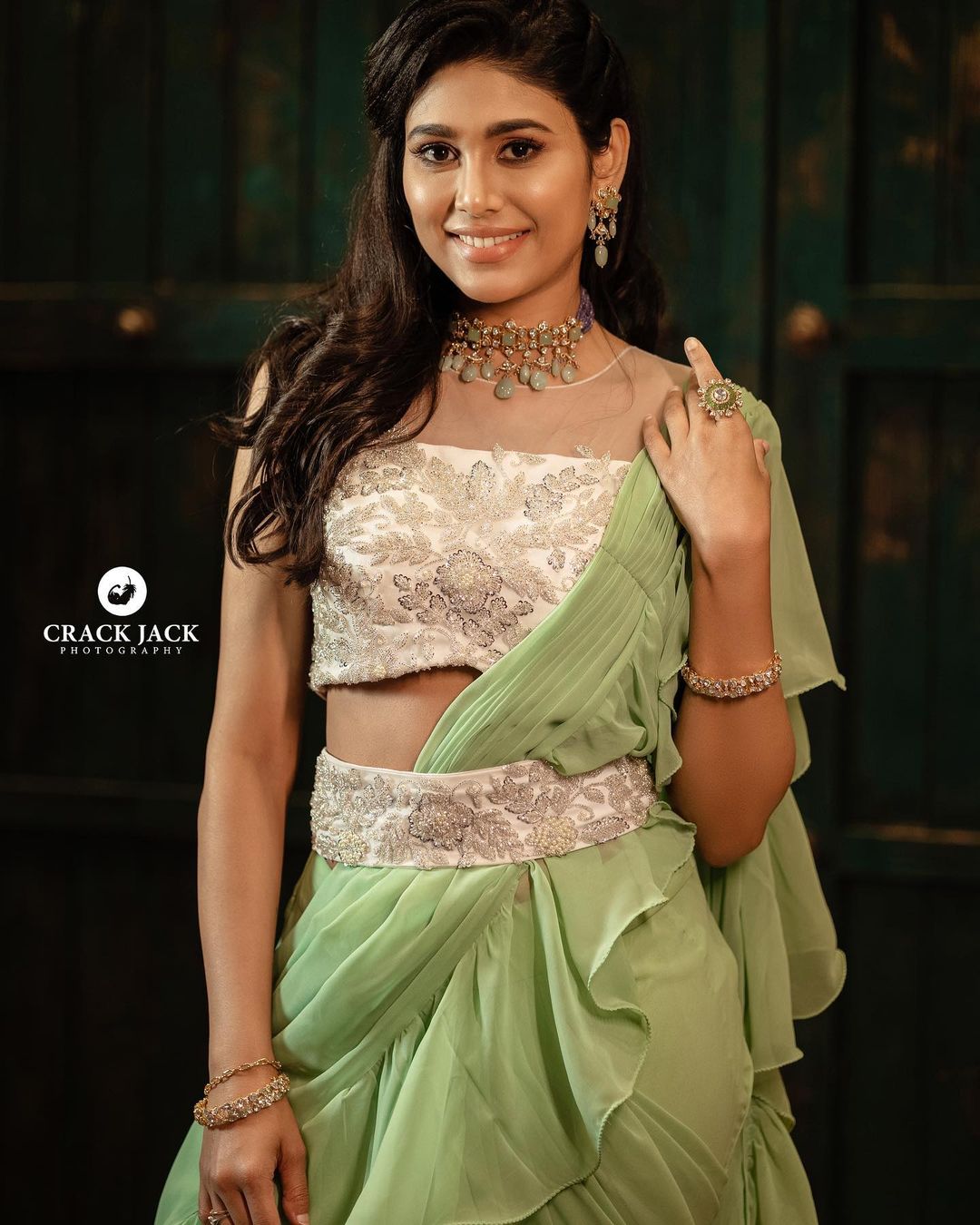 South Actress Manisha Yadav In Light Green Ruffled Saree With Embroidered Off White Blouse & Waist Belt Perfect Bridesmaid Look