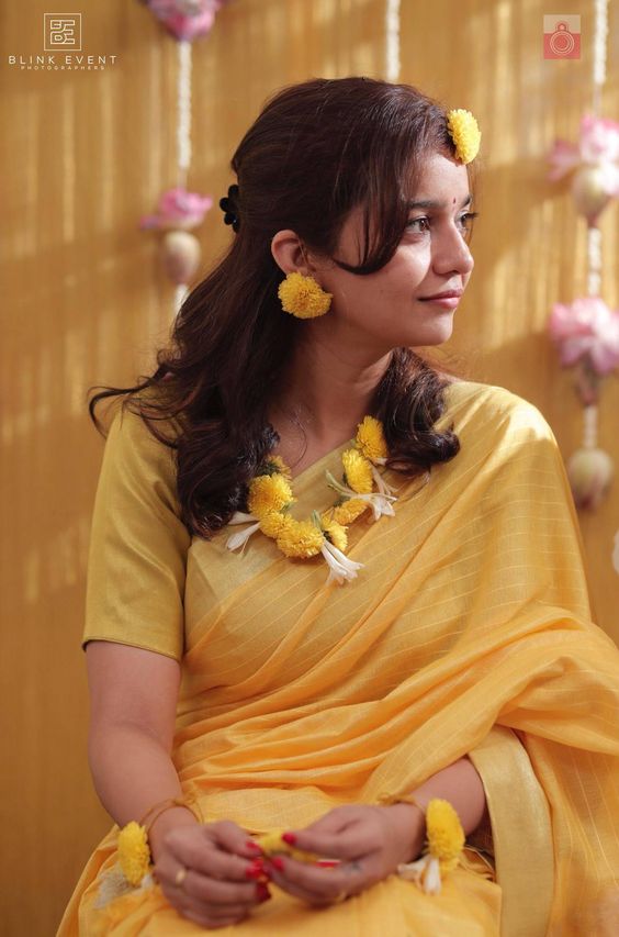 Swathi Reddy In Her Haldi Ceremony Wearing Yellow Silk Saree With Floral Jewellery Set Dressing Style, Outfits & Looks