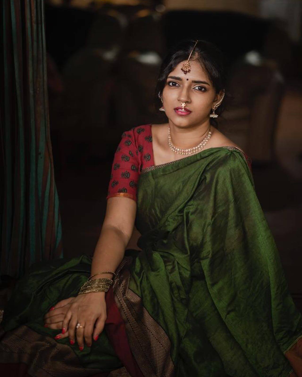 Tollywood Actress Vasundhara Kashyap In Green & Maroon Cotton Blend Saree Paired With Printed Maroon Blouse