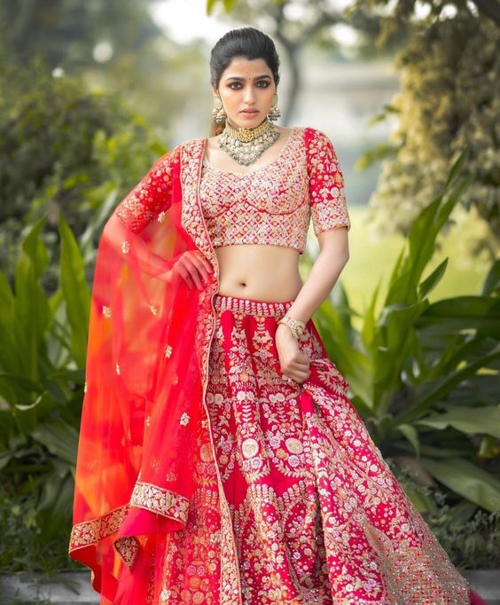 Tollywood Diva Sai Dhanshika In Red Bridal Lehenga Looks Regal