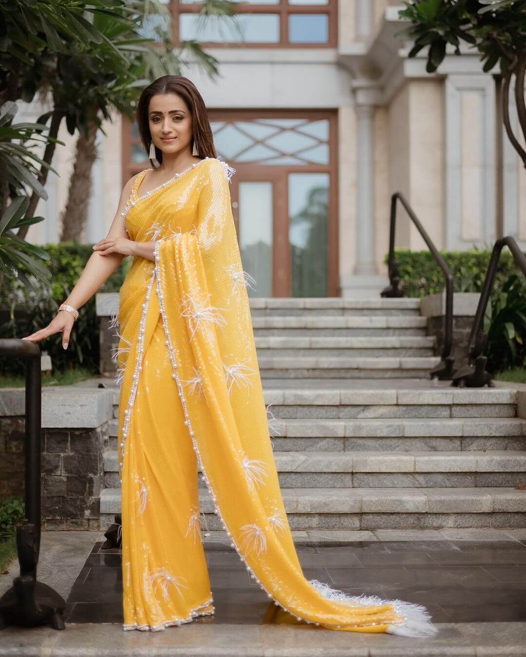Trisha Krishnan Look Beautiful In Yellow Sequinned Saree With Perl Embedded Border & Blouse