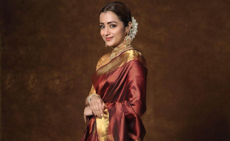 Trisha Krishnan Look Stunningly Beautiful In Maroon & Gold Ethnic Zari Silk Blend Banarasi Saree