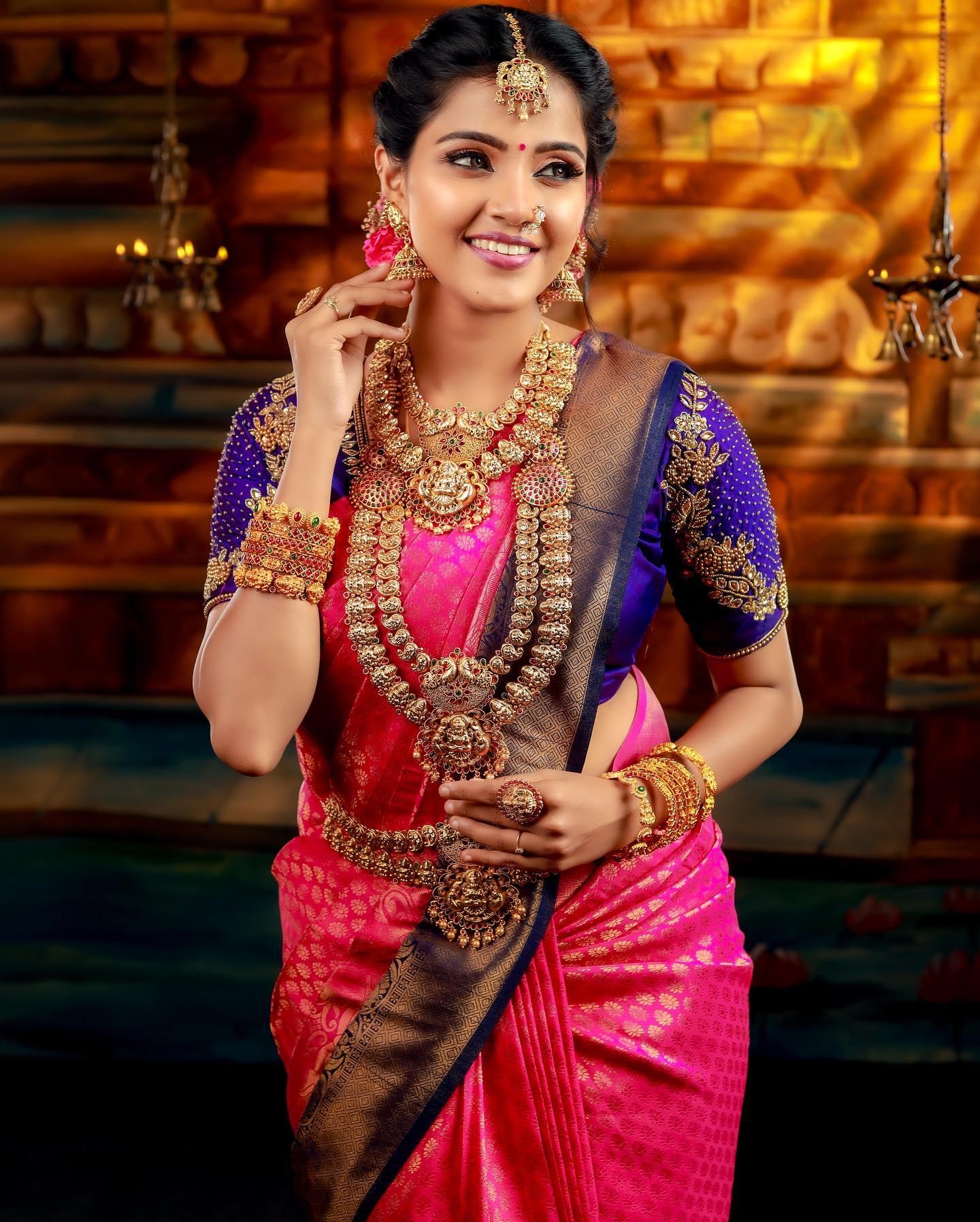 Vaishali Thaniga In Pink Silk Saree With Embellished Blue Blouse & Heavy Matt Gold Bridal Jewellery