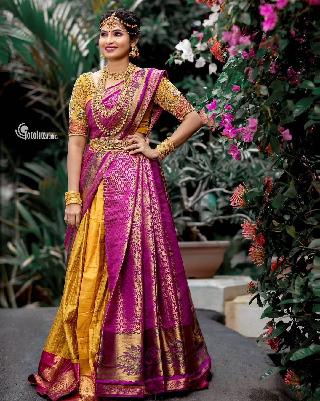 Venba In Traditional South Indian Yellow & Purple Lehenga Saree Look With Heavy Gold Jewellery