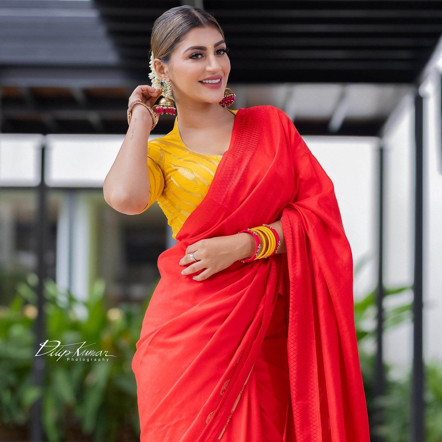 Yashika Aannand Chick & Sleek Look In Red Saree Paired With Yellow Blouse