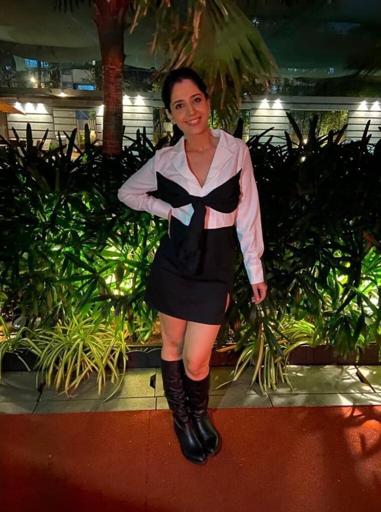Young & Beautiful Simran Pareenja In White & Black Knot Dress With High Knees Black Boots